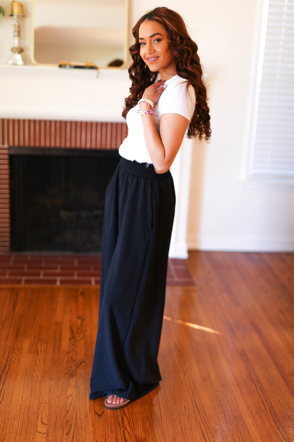 Shop Everyday Black Smocked Waist Palazzo Pants-Pants at Ruby Joy Boutique, a Women's Clothing Store in Pickerington, Ohio