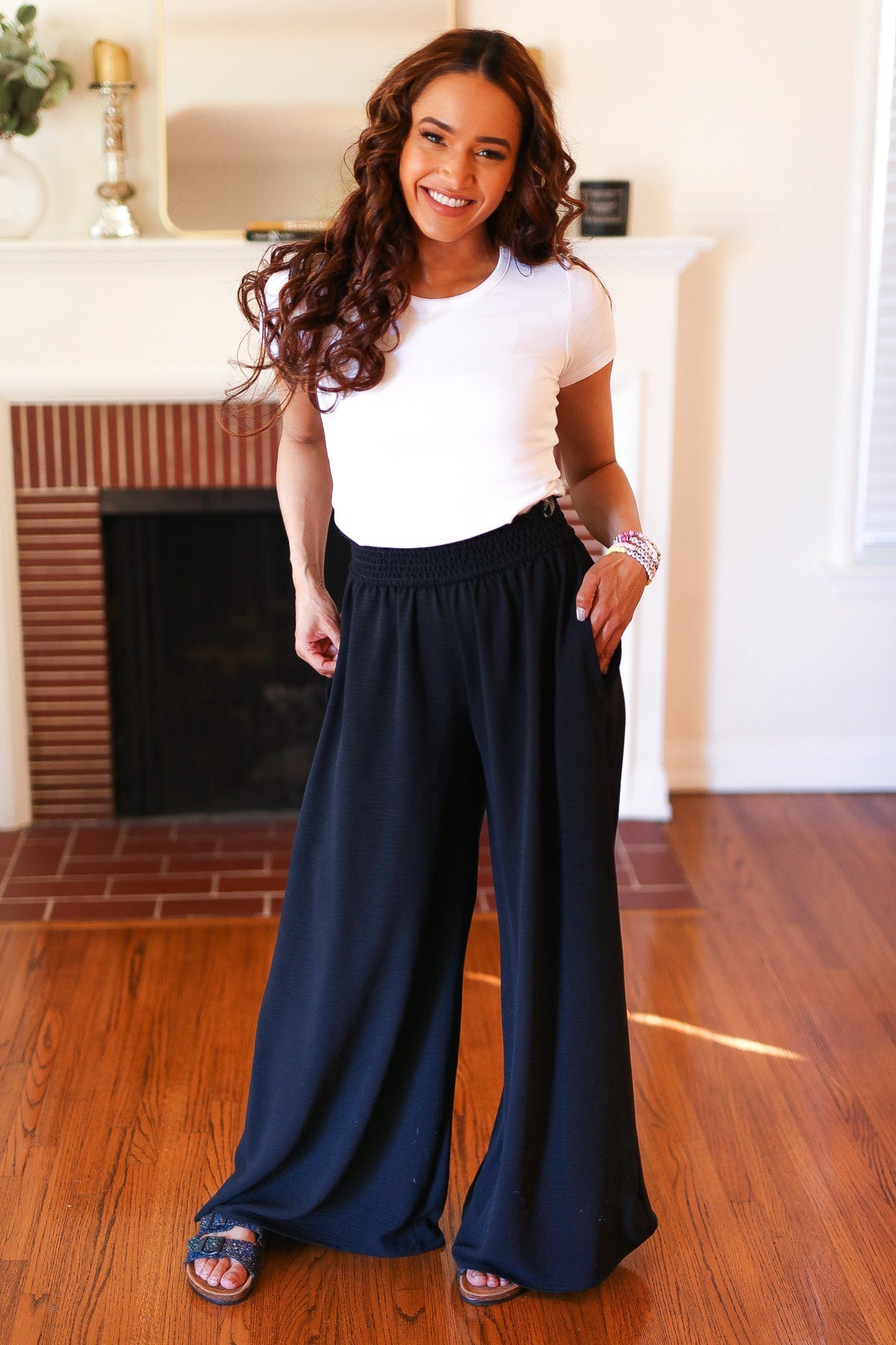 Shop Everyday Black Smocked Waist Palazzo Pants-Pants at Ruby Joy Boutique, a Women's Clothing Store in Pickerington, Ohio