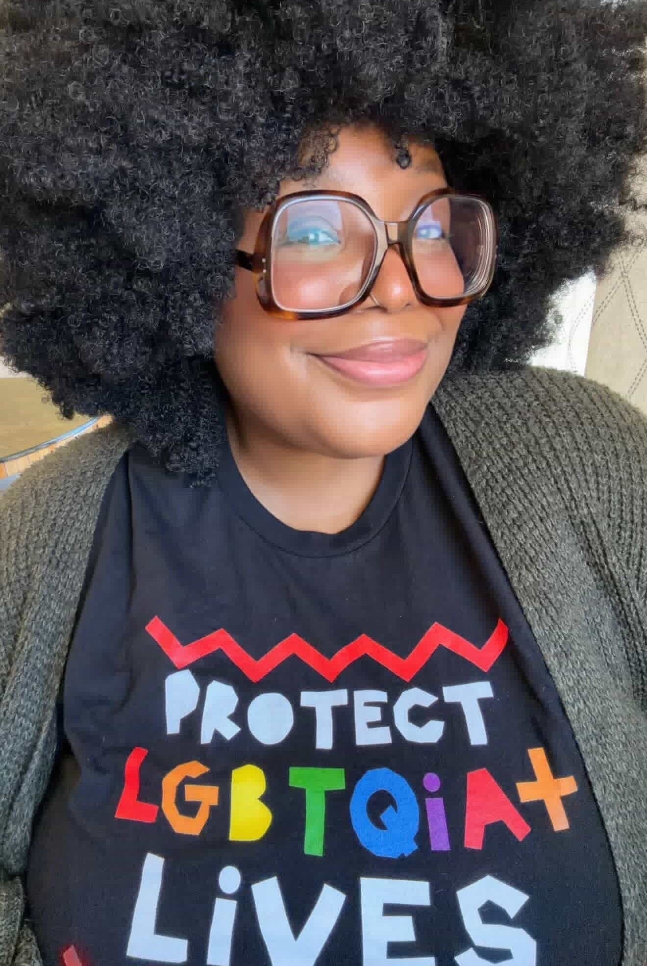 Shop Protect LGBTQIA+ Lives Classic Tee- at Ruby Joy Boutique, a Women's Clothing Store in Pickerington, Ohio