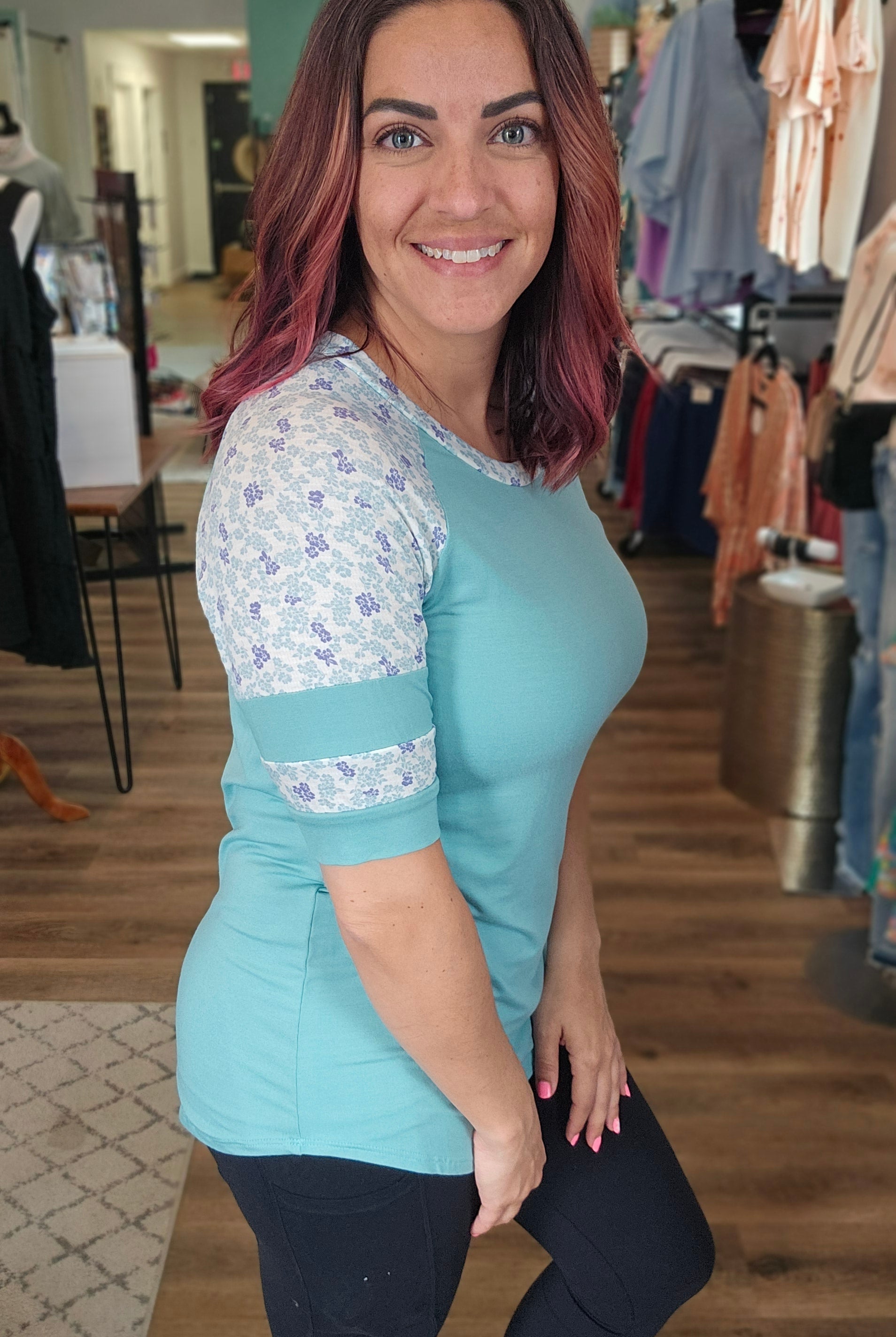 Shop Floral Baseball Sleeve Top-Short Sleeve Top at Ruby Joy Boutique, a Women's Clothing Store in Pickerington, Ohio
