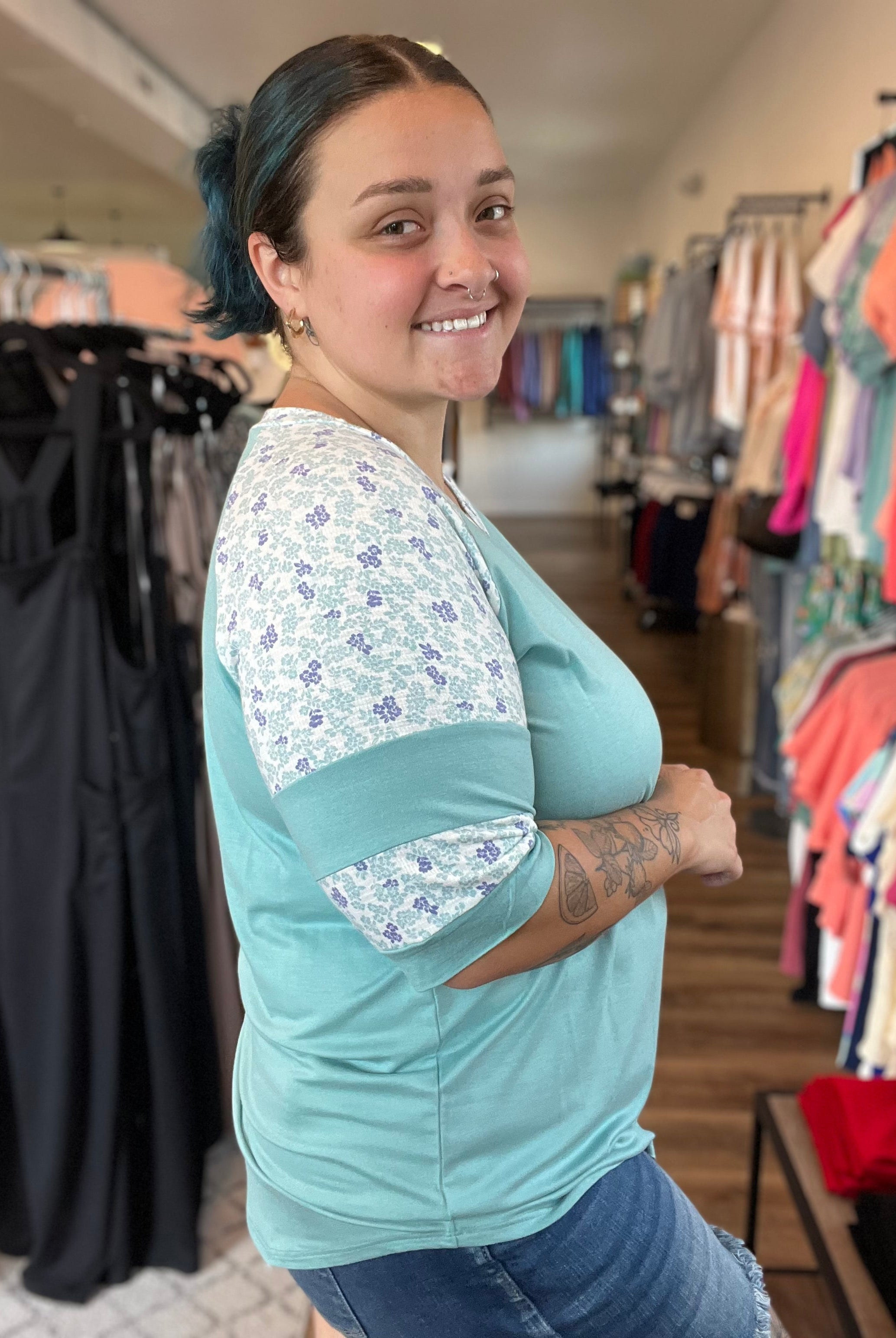 Shop Floral Baseball Sleeve Top-Short Sleeve Top at Ruby Joy Boutique, a Women's Clothing Store in Pickerington, Ohio