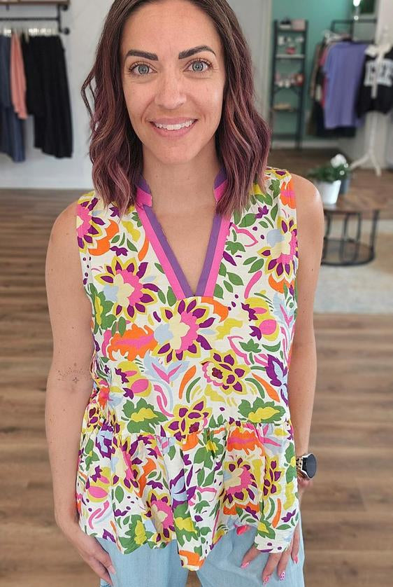 Shop Floral Print Contrast Trim Sleeveless Peplum Blouse- at Ruby Joy Boutique, a Women's Clothing Store in Pickerington, Ohio