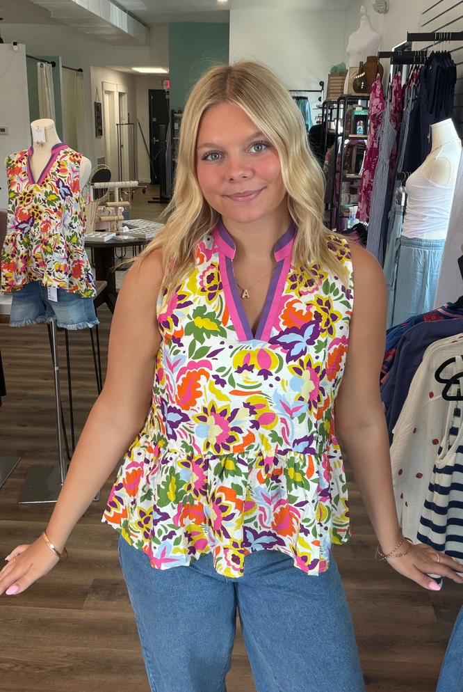 Shop Floral Print Contrast Trim Sleeveless Peplum Blouse- at Ruby Joy Boutique, a Women's Clothing Store in Pickerington, Ohio