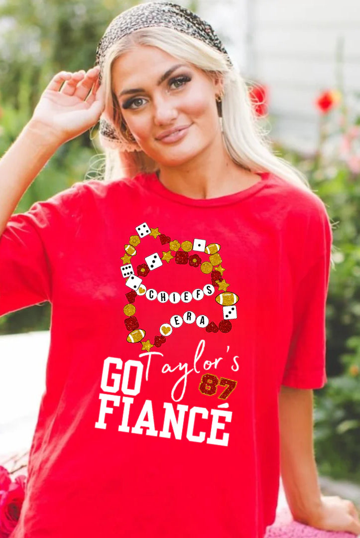 Shop Go Taylor’s Fiancé Bracelet Graphic-Red Comfort Colors Tee at Ruby Joy Boutique, a Women's Clothing Store in Pickerington, Ohio
