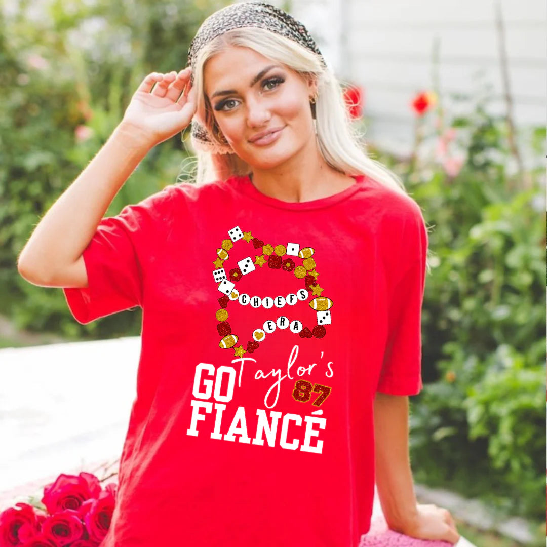 Shop Go Taylor’s Fiancé Bracelet Graphic-Red Comfort Colors Tee at Ruby Joy Boutique, a Women's Clothing Store in Pickerington, Ohio
