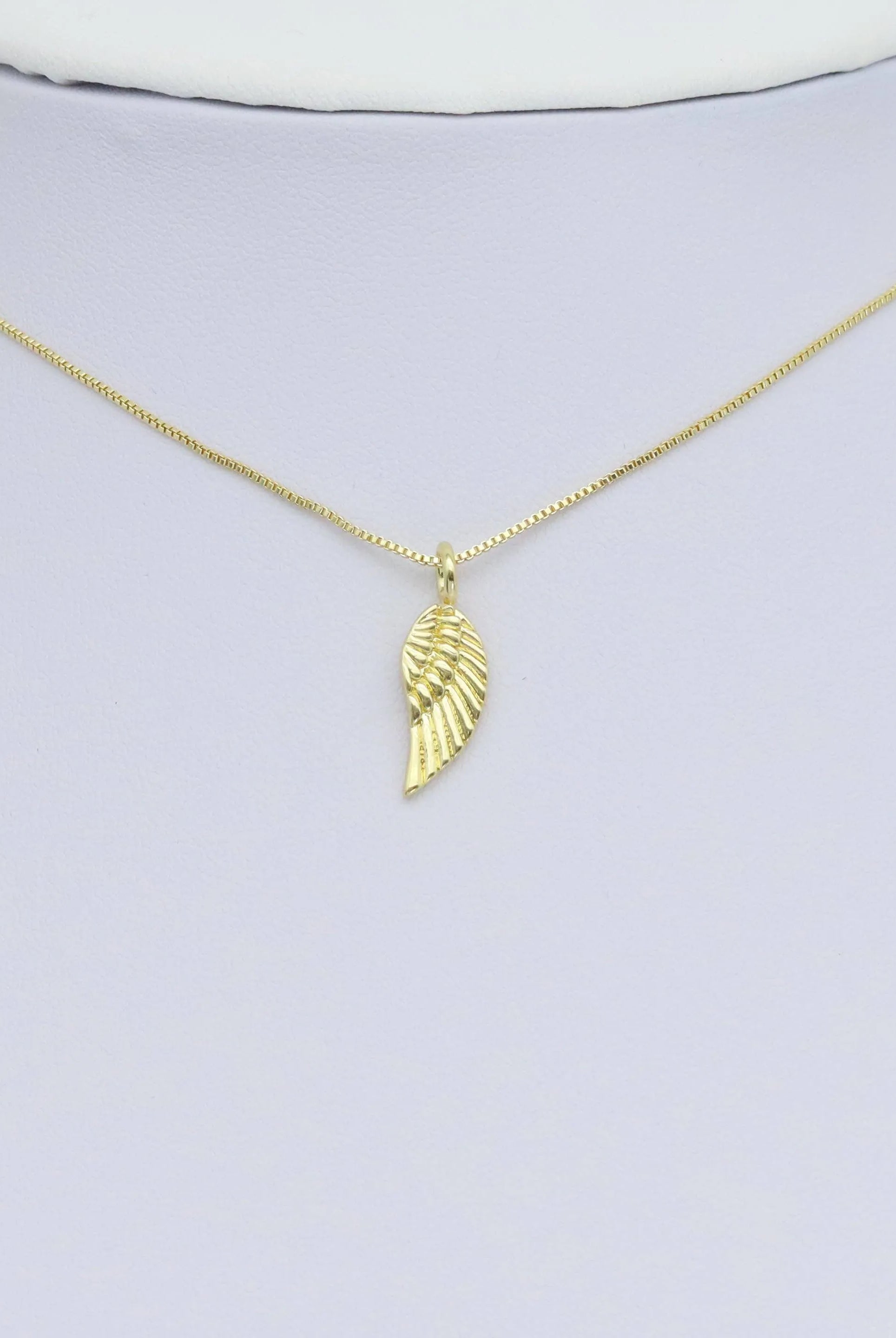 Shop Gold Wing Charm- at Ruby Joy Boutique, a Women's Clothing Store in Pickerington, Ohio