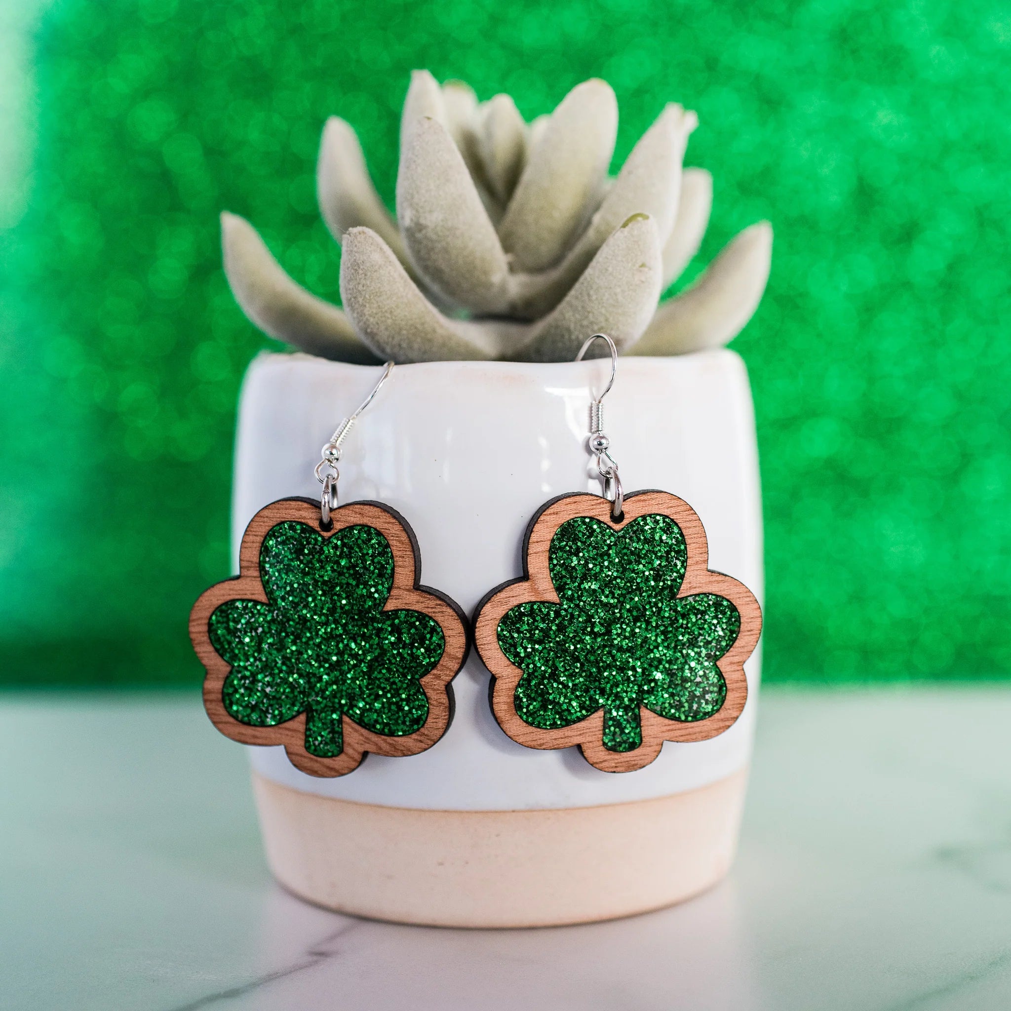 Shop Green Glitter Shamrock Dangle - St Patrick Paddy Day Earrings-Earrings at Ruby Joy Boutique, a Women's Clothing Store in Pickerington, Ohio