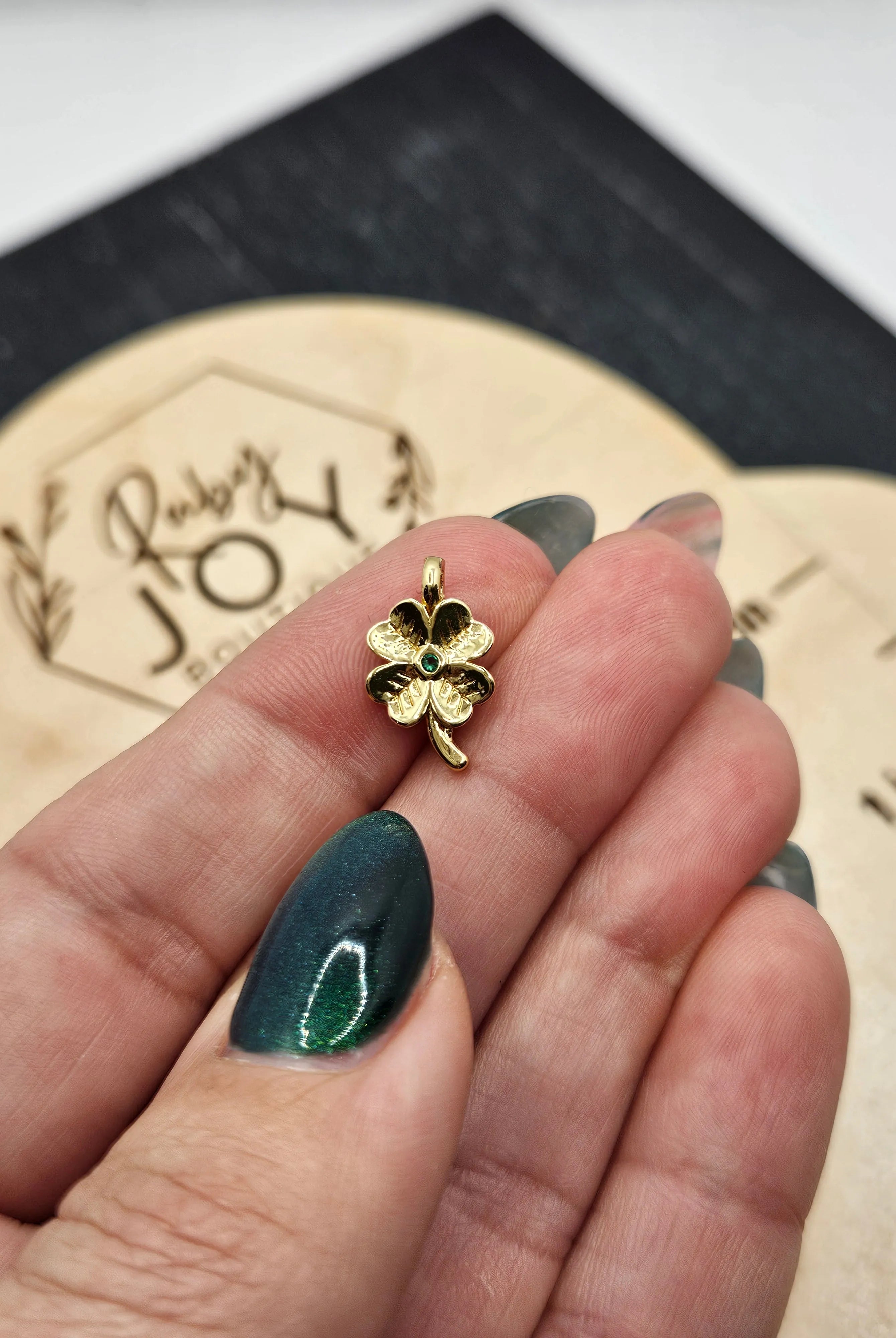 Shop Green Pave Clover Charm- at Ruby Joy Boutique, a Women's Clothing Store in Pickerington, Ohio