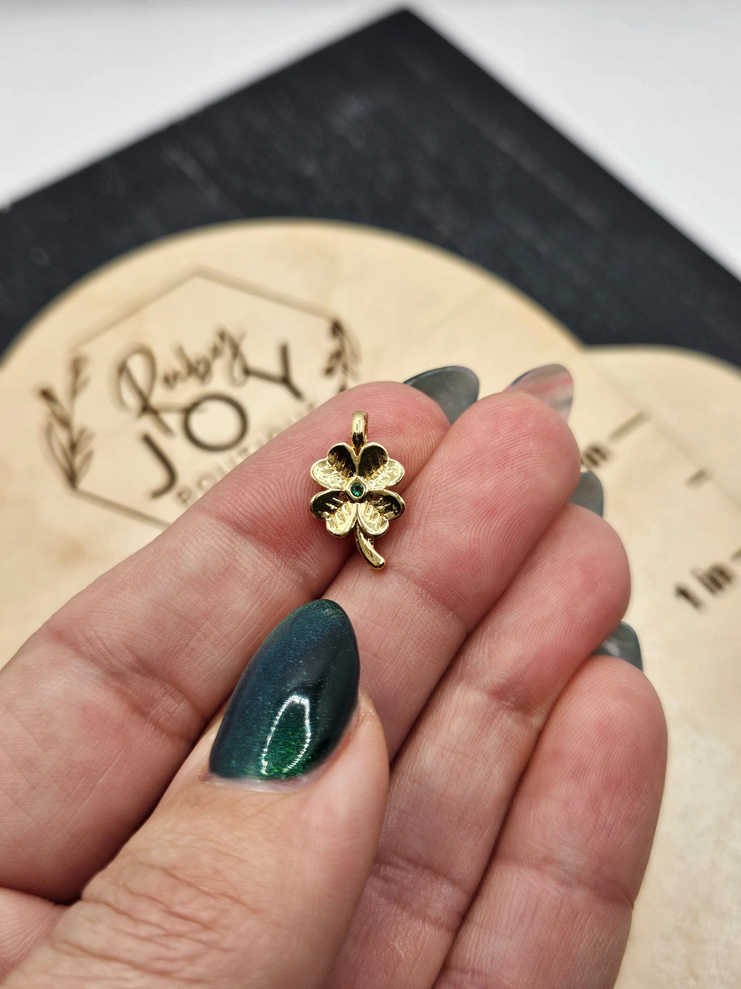 Shop Green Pave Clover Charm- at Ruby Joy Boutique, a Women's Clothing Store in Pickerington, Ohio