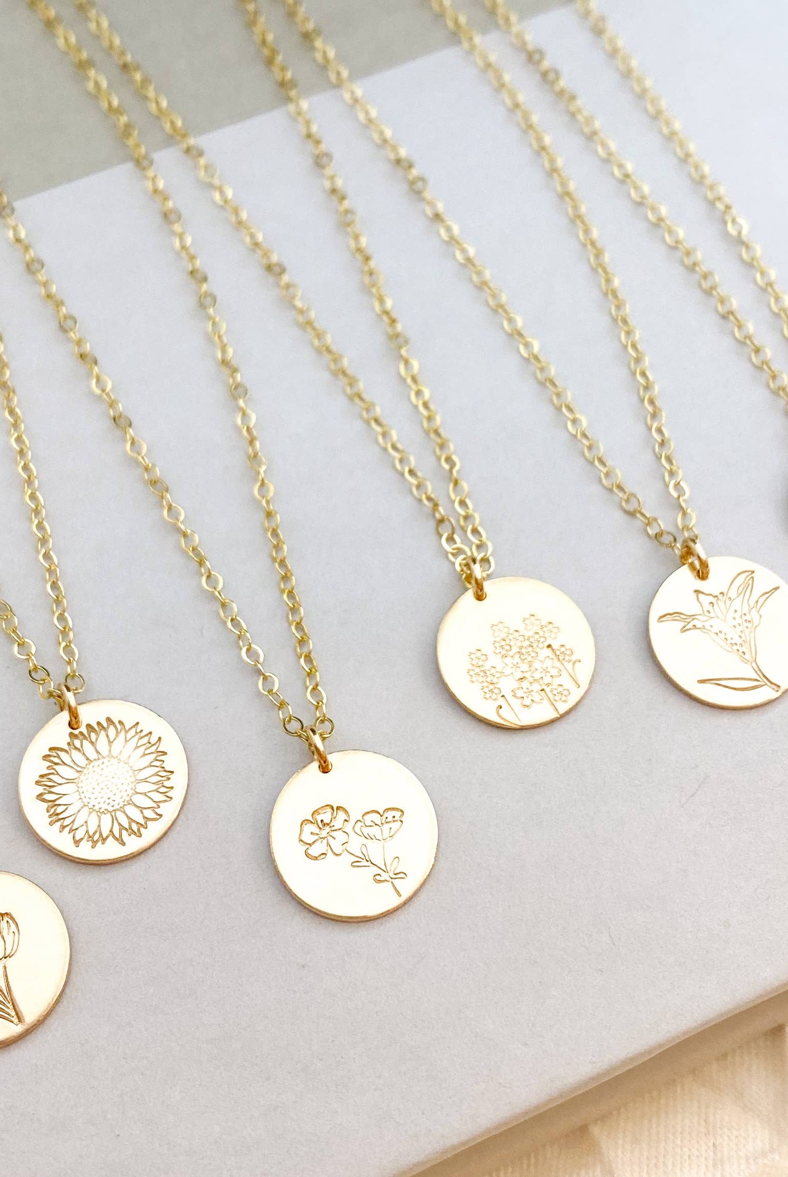 Shop Hand Stamped Birth Flower Necklaces-Necklaces at Ruby Joy Boutique, a Women's Clothing Store in Pickerington, Ohio