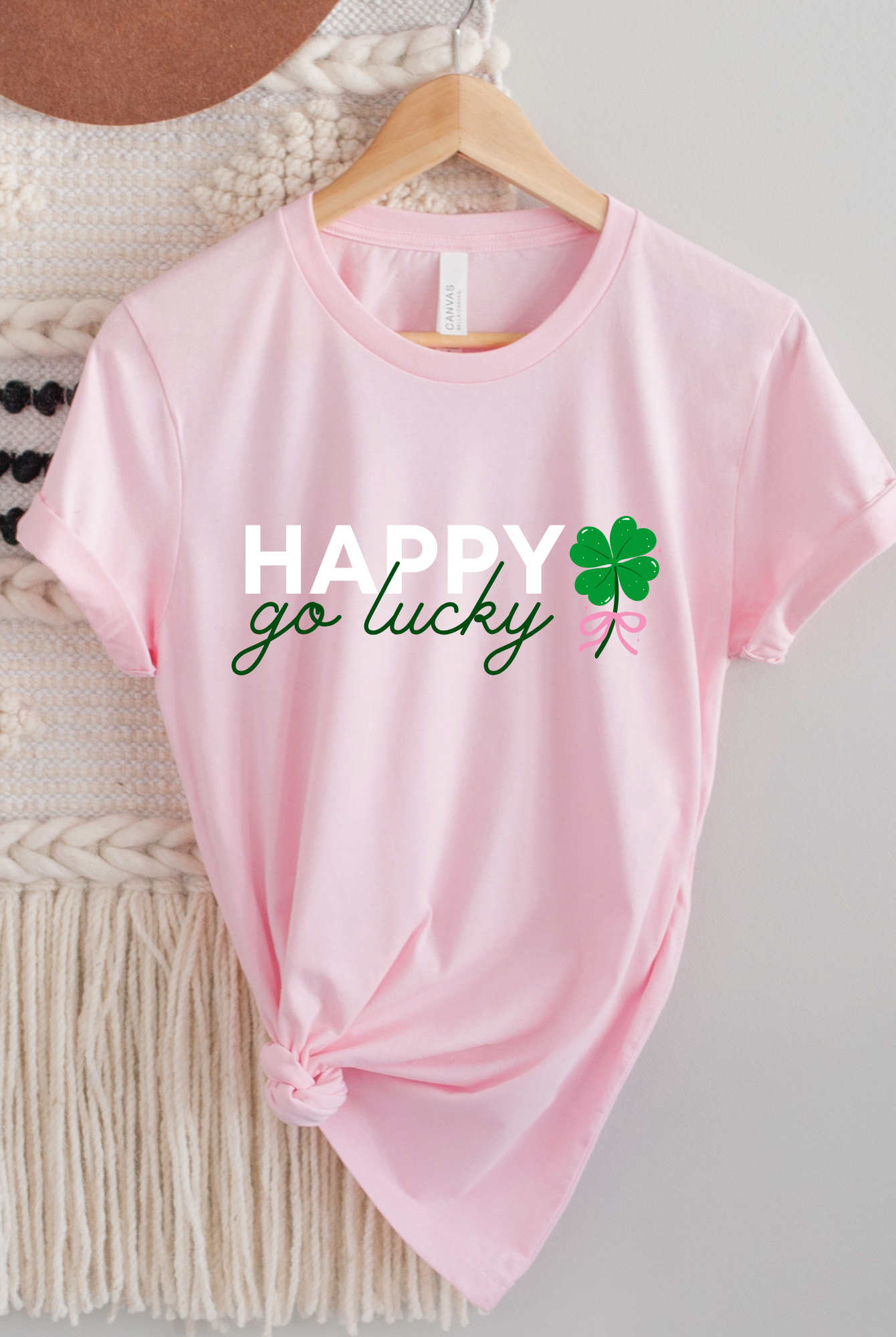Shop Happy Go Lucky | St. Patrick's Day Graphic Top-Tee at Ruby Joy Boutique, a Women's Clothing Store in Pickerington, Ohio