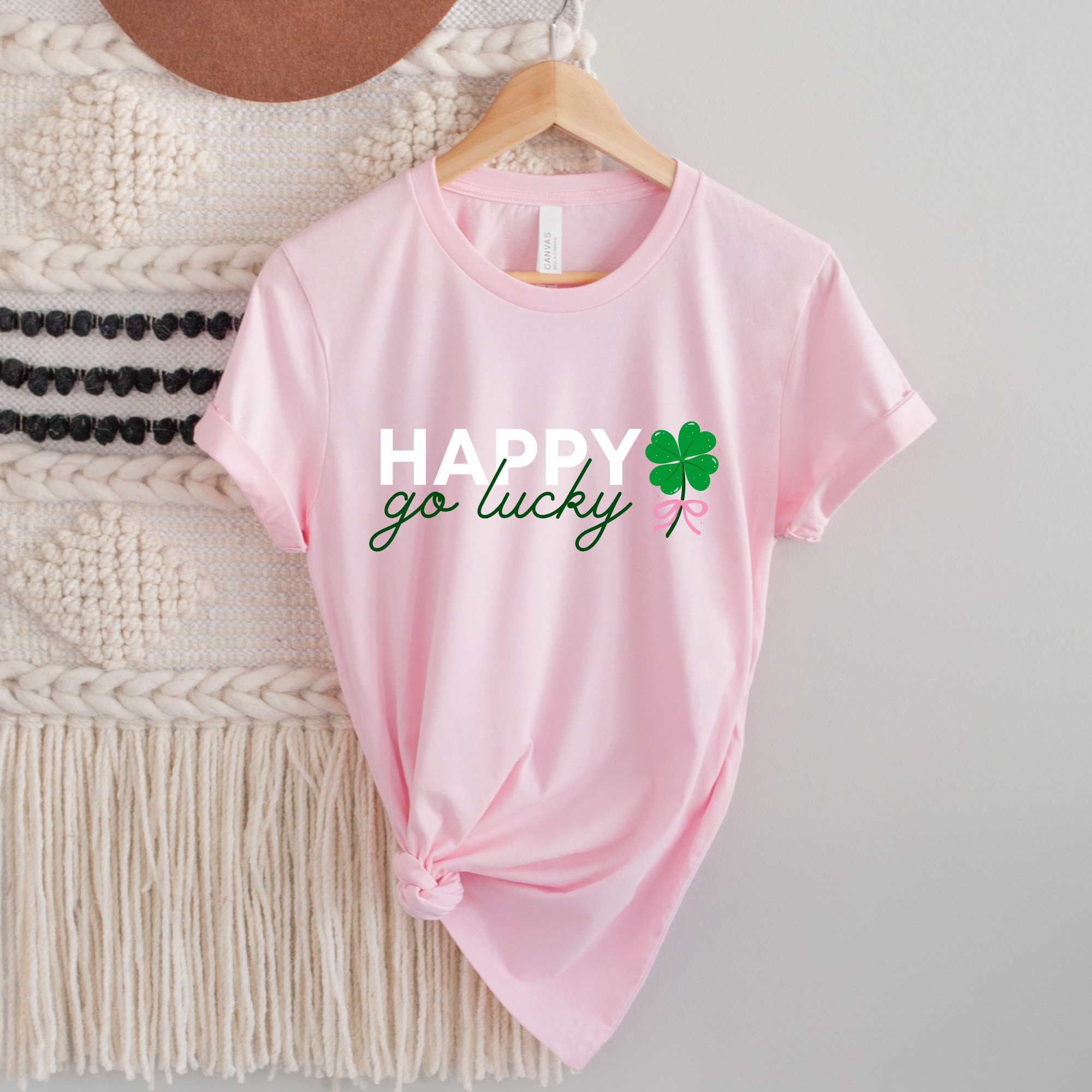Shop Happy Go Lucky | St. Patrick's Day Graphic Top-Tee at Ruby Joy Boutique, a Women's Clothing Store in Pickerington, Ohio