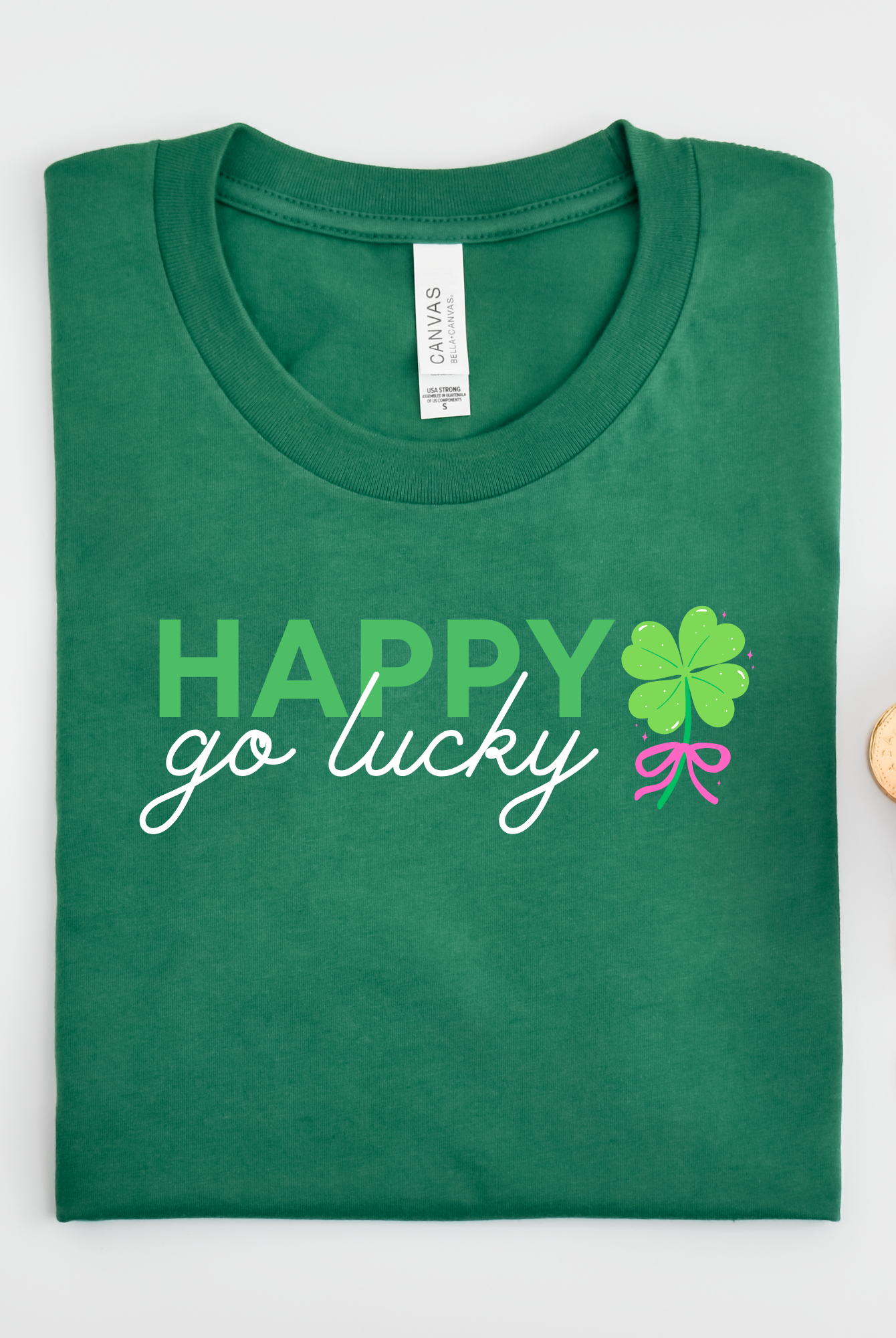 Shop Happy Go Lucky | St. Patrick's Day Graphic Top-Tee at Ruby Joy Boutique, a Women's Clothing Store in Pickerington, Ohio