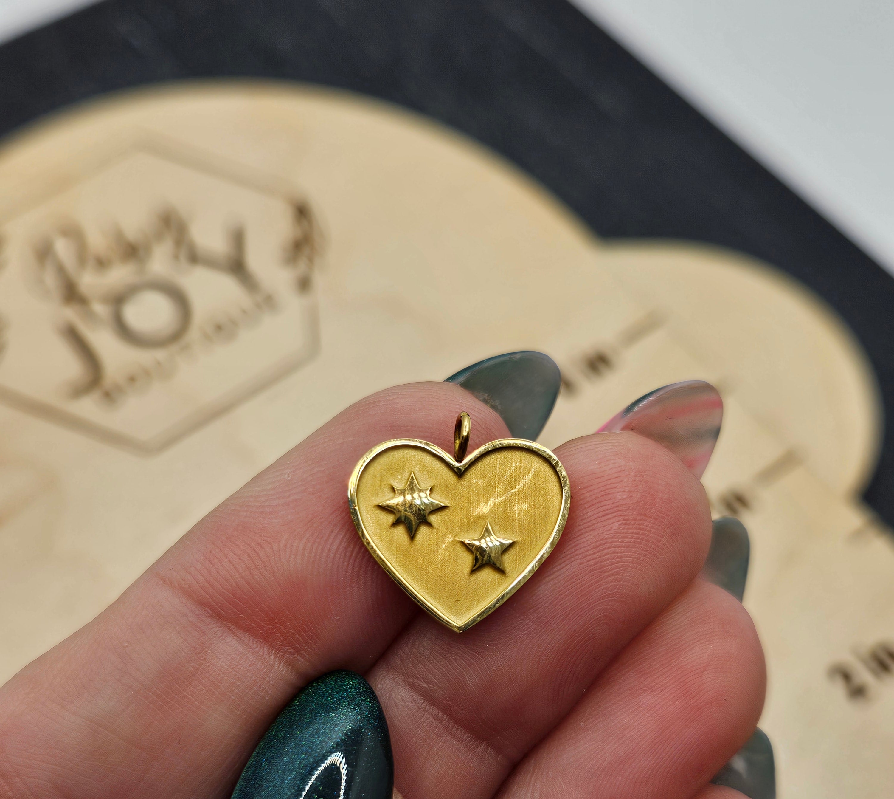 Shop Heart with Stars Charm- at Ruby Joy Boutique, a Women's Clothing Store in Pickerington, Ohio