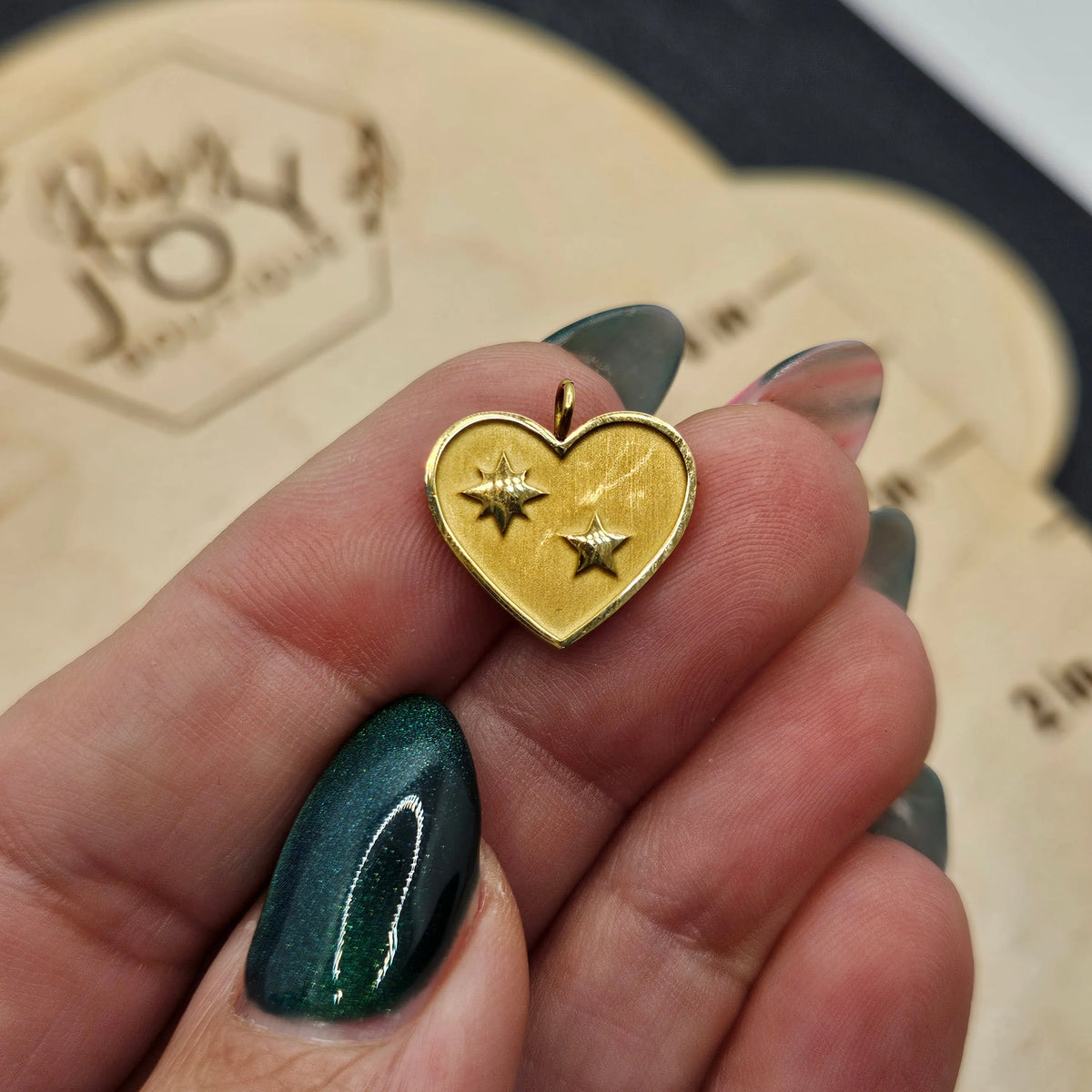 Shop Heart with Stars Charm- at Ruby Joy Boutique, a Women's Clothing Store in Pickerington, Ohio