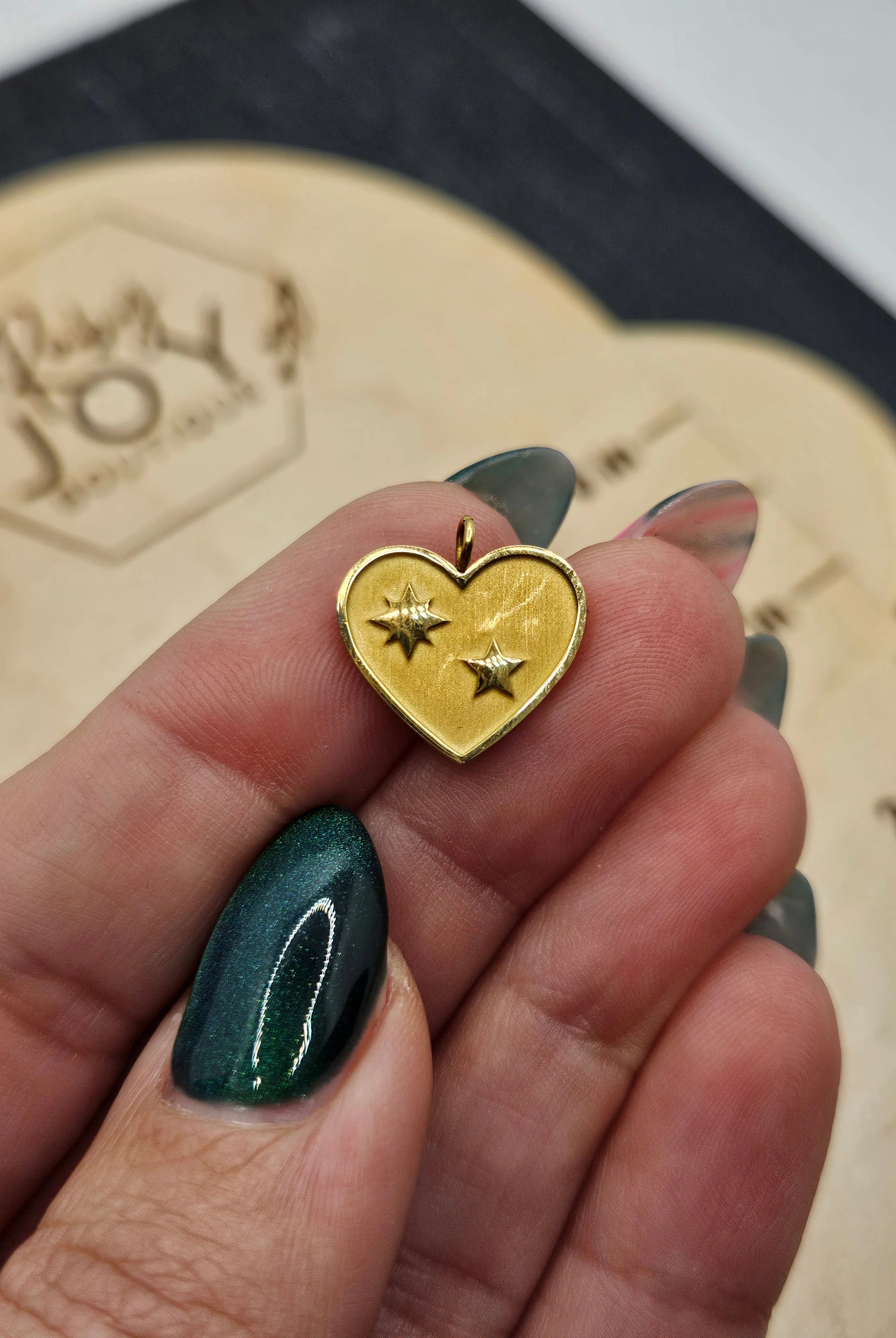 Shop Heart with Stars Charm- at Ruby Joy Boutique, a Women's Clothing Store in Pickerington, Ohio