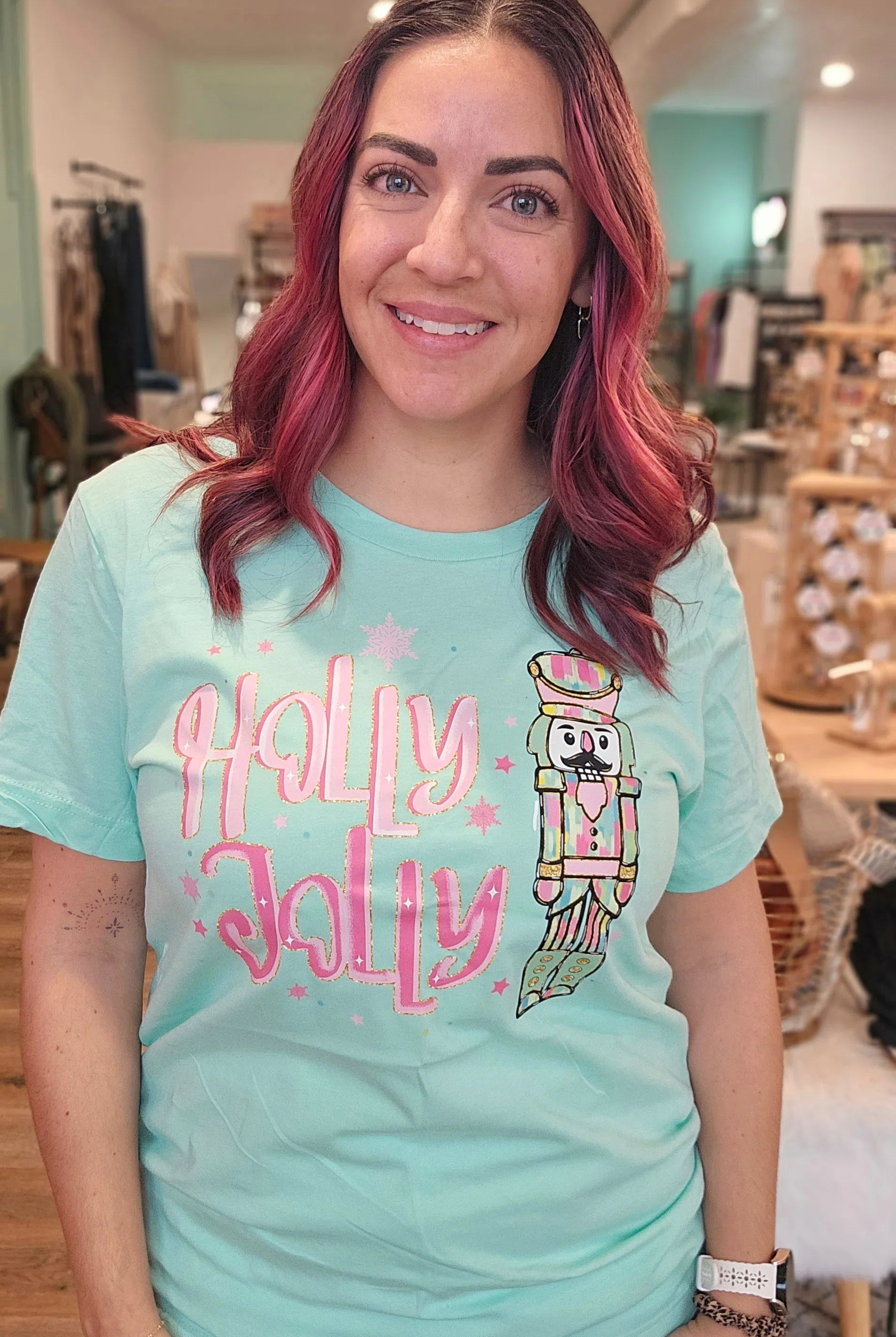 Shop Holly Jolly Bright Nutcracker Tee-Graphic Tee at Ruby Joy Boutique, a Women's Clothing Store in Pickerington, Ohio