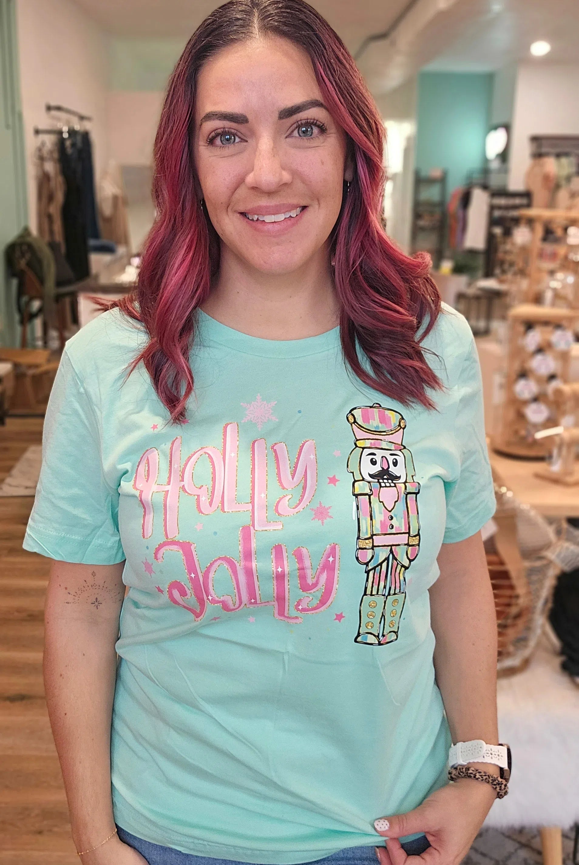 Shop Holly Jolly Bright Nutcracker Tee-Graphic Tee at Ruby Joy Boutique, a Women's Clothing Store in Pickerington, Ohio