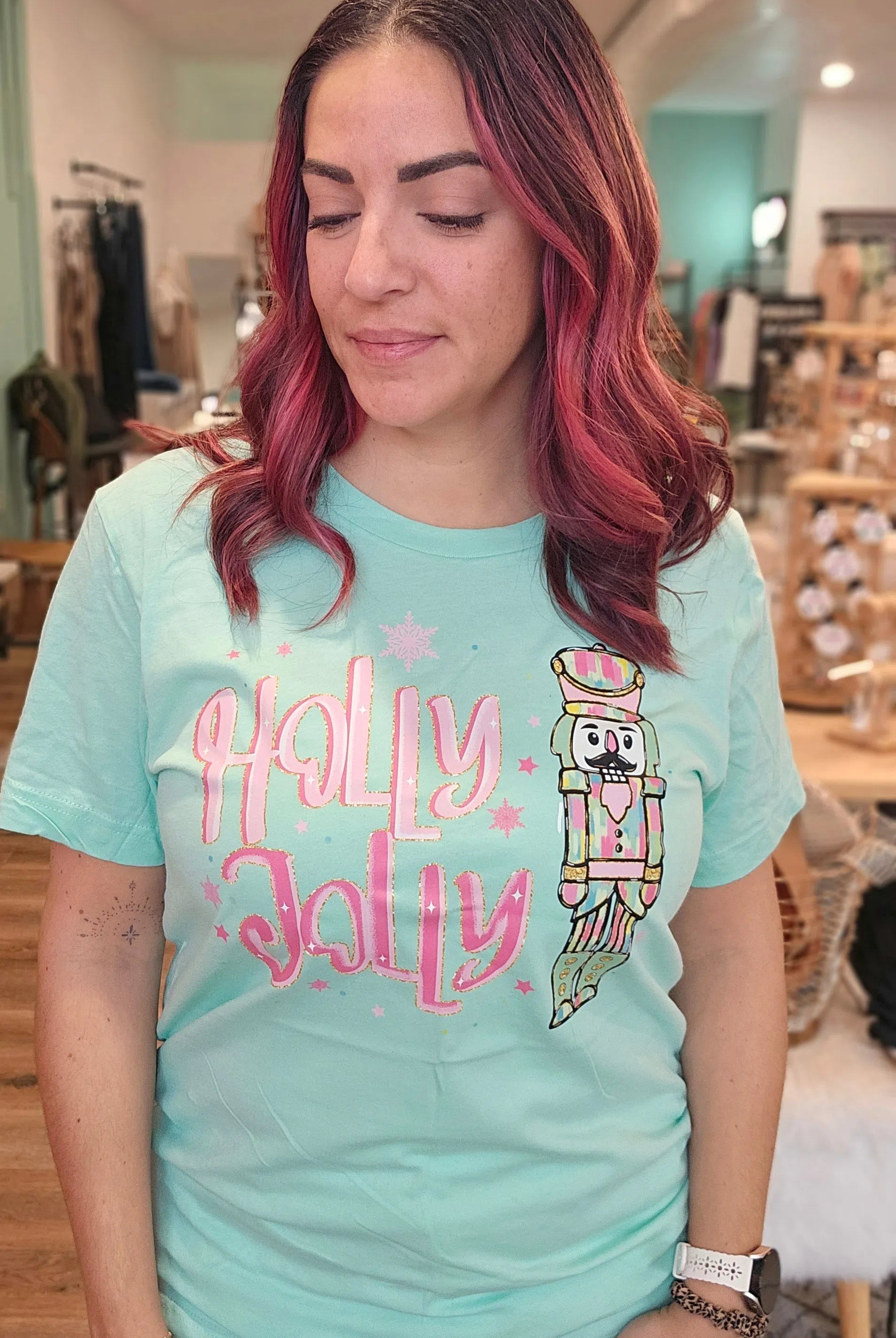 Shop Holly Jolly Bright Nutcracker Tee-Graphic Tee at Ruby Joy Boutique, a Women's Clothing Store in Pickerington, Ohio