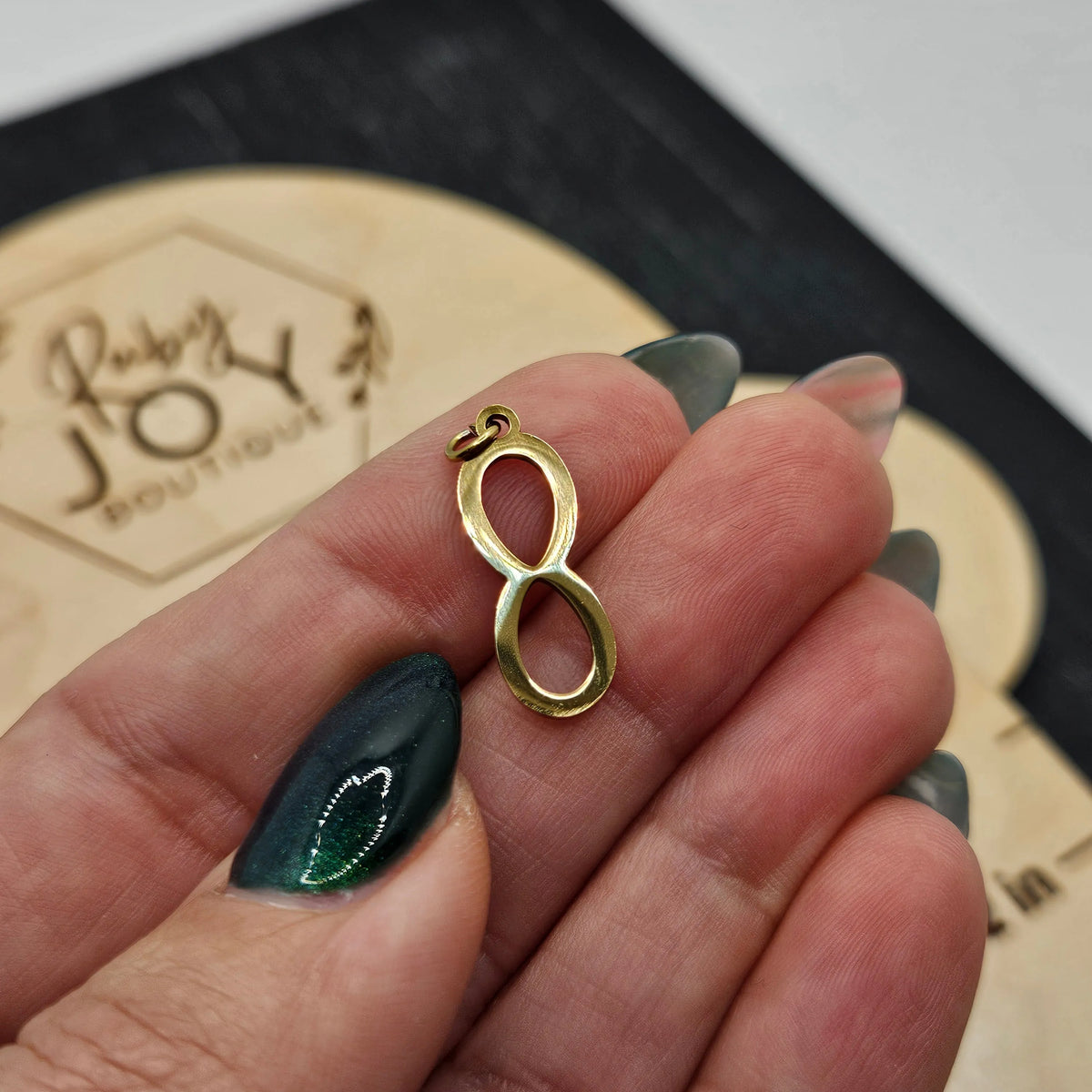 Shop Infinity Charm- at Ruby Joy Boutique, a Women's Clothing Store in Pickerington, Ohio