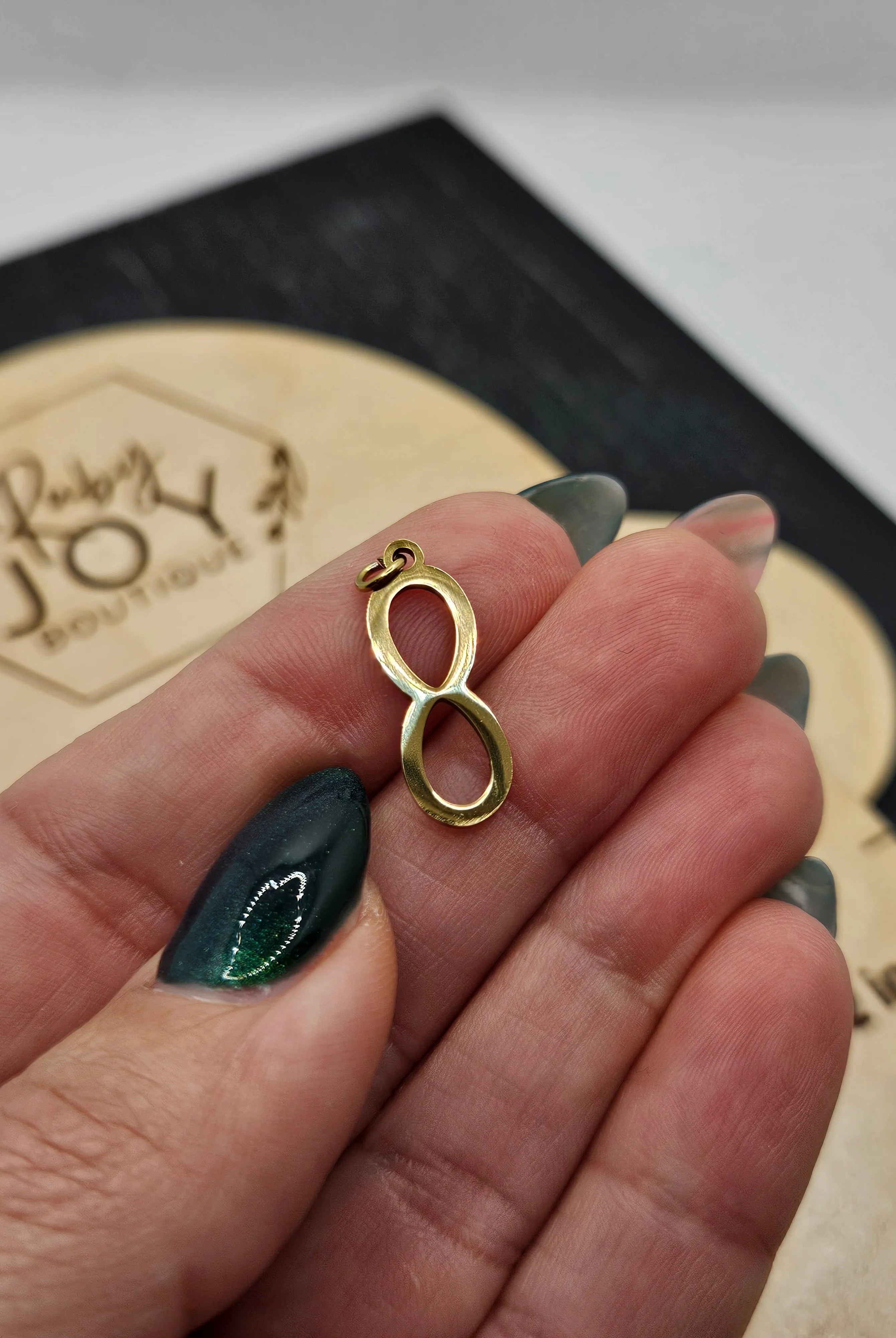 Shop Infinity Charm- at Ruby Joy Boutique, a Women's Clothing Store in Pickerington, Ohio