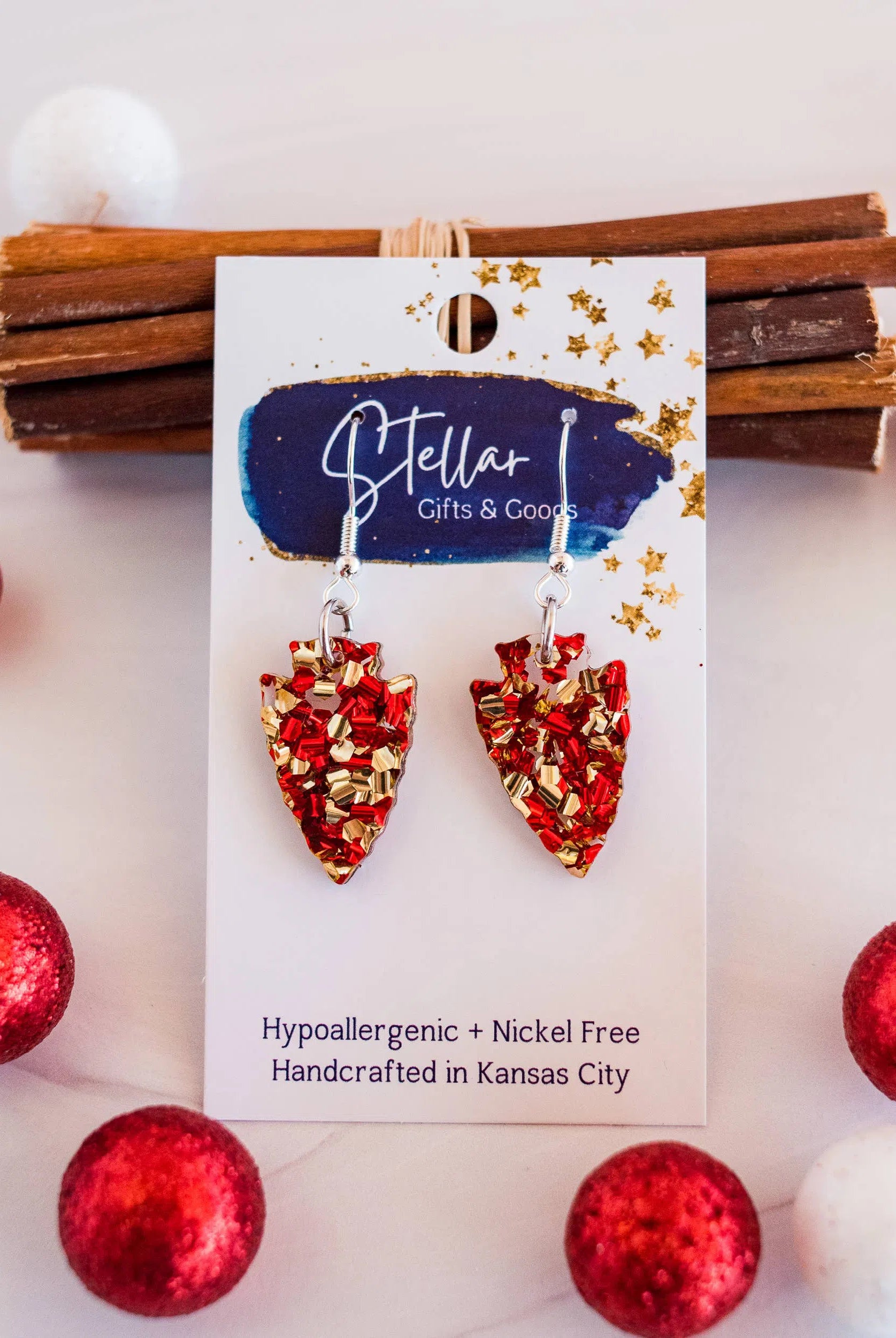 Shop Kansas City Chiefs Petite Chunky Glitter Arrowhead Dangles-Earrings at Ruby Joy Boutique, a Women's Clothing Store in Pickerington, Ohio