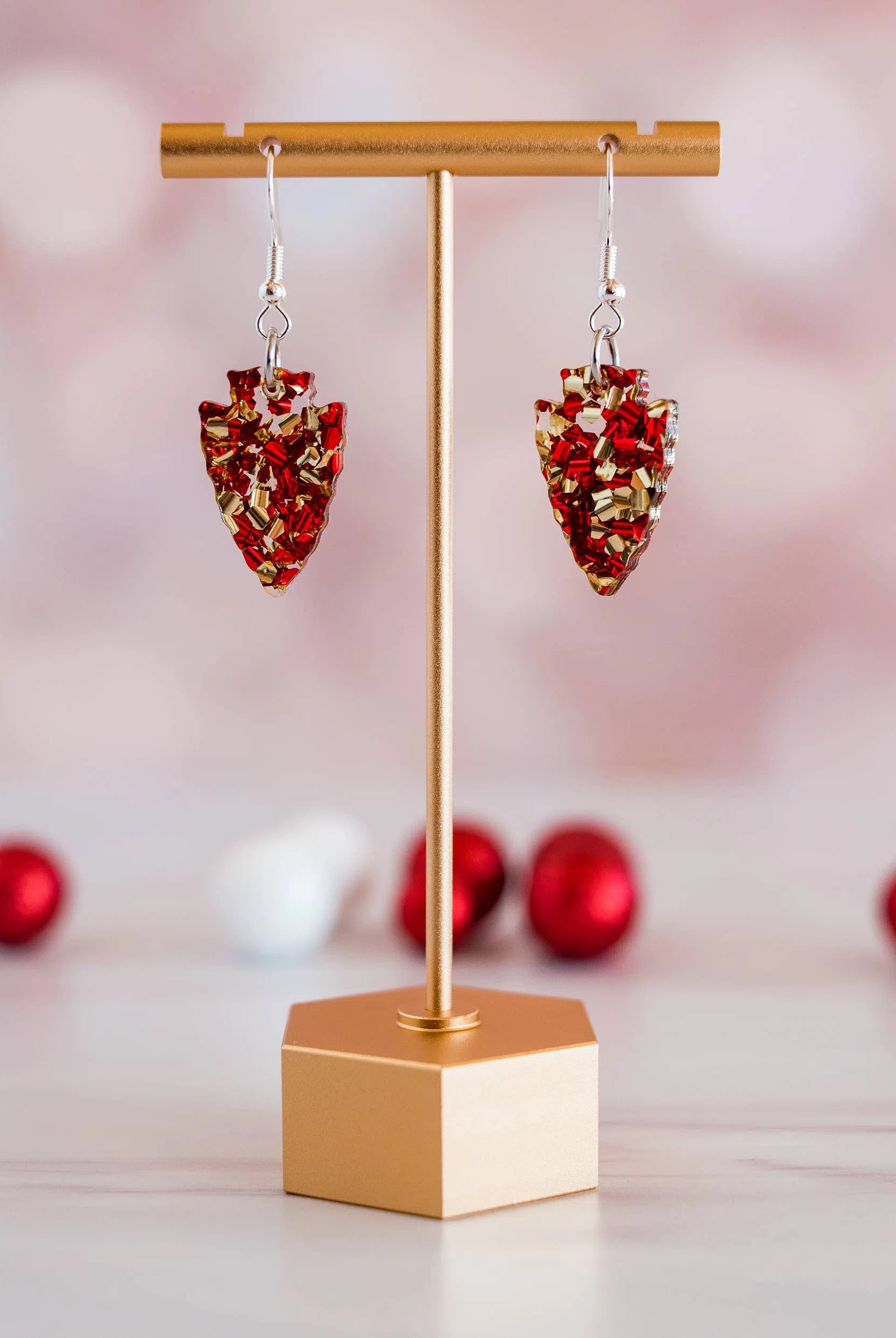 Shop Kansas City Chiefs Petite Chunky Glitter Arrowhead Dangles-Earrings at Ruby Joy Boutique, a Women's Clothing Store in Pickerington, Ohio