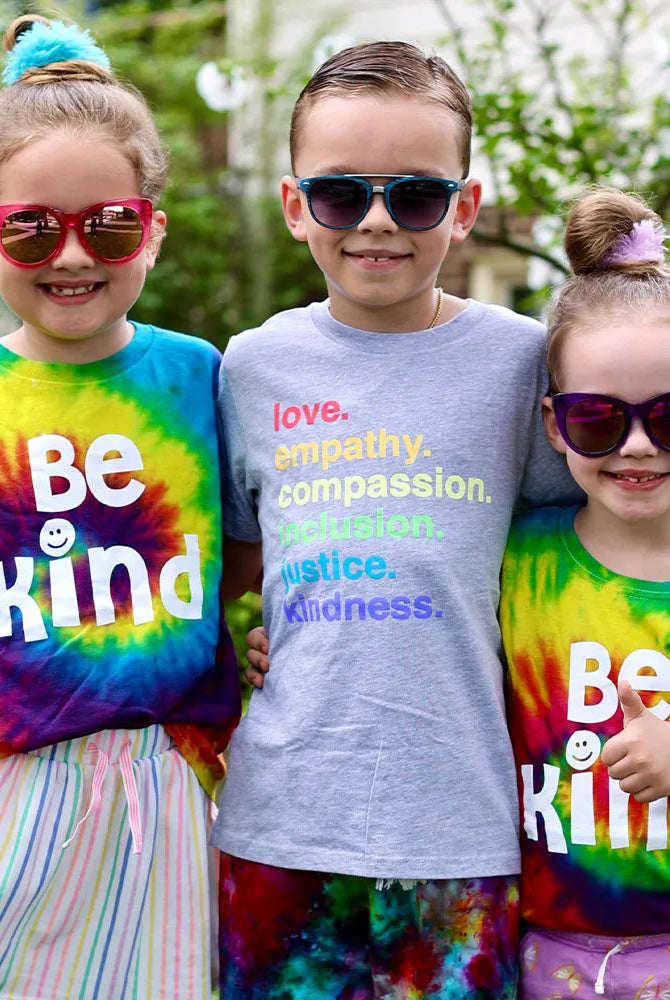 Shop 'Kindness Is' Pride Kids Tee | Kind Cotton- at Ruby Joy Boutique, a Women's Clothing Store in Pickerington, Ohio