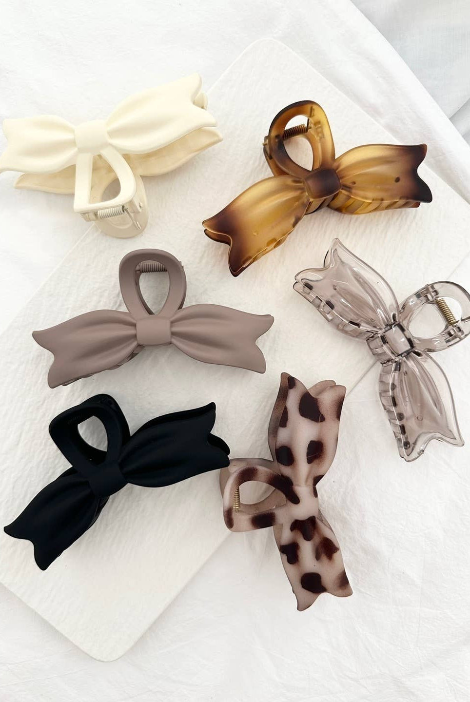 Shop Large Bow Tie Hair Claw Clips- at Ruby Joy Boutique, a Women's Clothing Store in Pickerington, Ohio