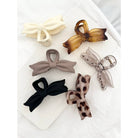 Shop Large Bow Tie Hair Claw Clips- at Ruby Joy Boutique, a Women's Clothing Store in Pickerington, Ohio