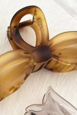 Shop Large Bow Tie Hair Claw Clips-Tortoise at Ruby Joy Boutique, a Women's Clothing Store in Pickerington, Ohio