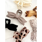 Shop Large Bow Tie Hair Claw Clips- at Ruby Joy Boutique, a Women's Clothing Store in Pickerington, Ohio
