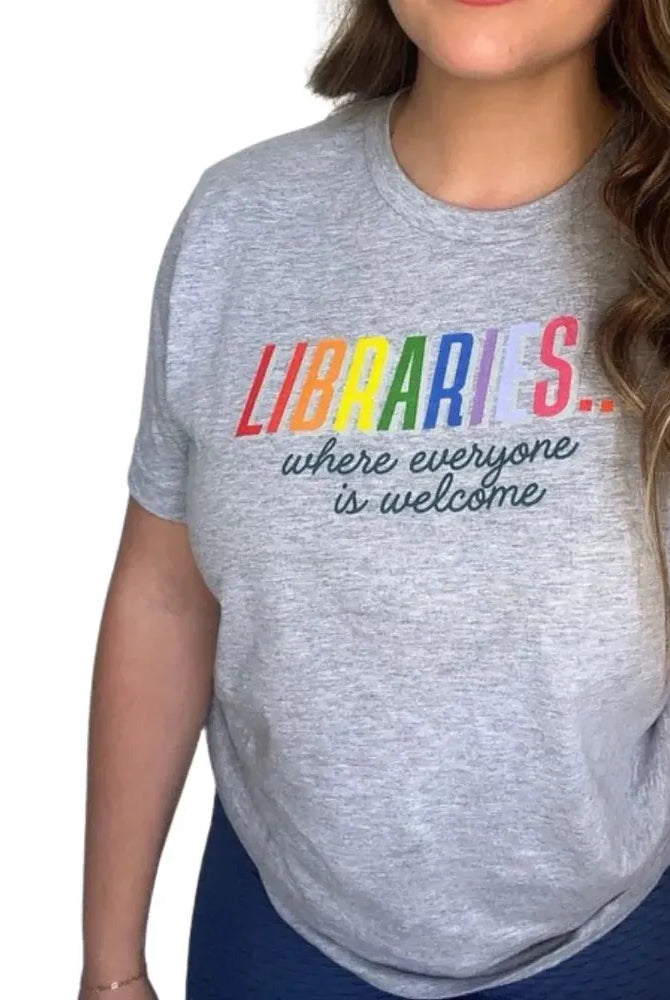 Shop Libraries Where Everyone is Welcome Classic Tee | Kind Cotton- at Ruby Joy Boutique, a Women's Clothing Store in Pickerington, Ohio