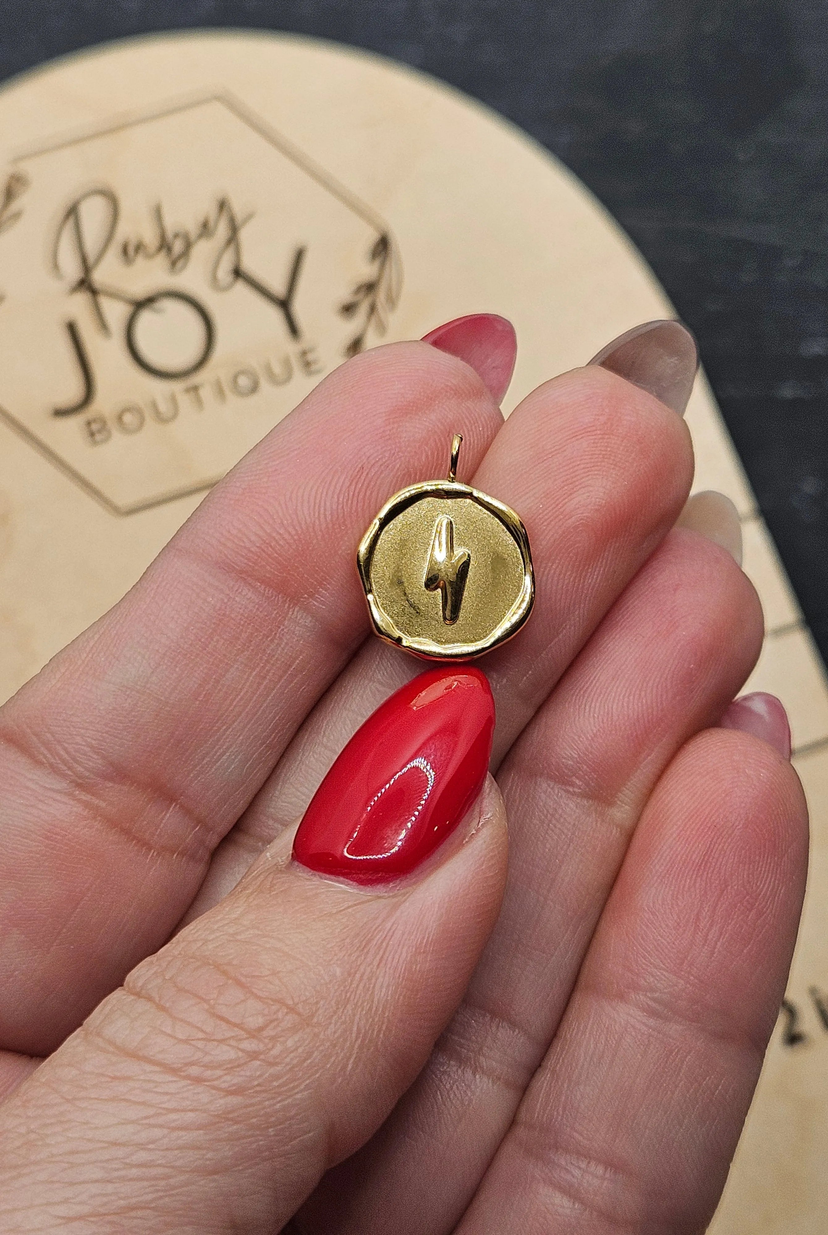Shop Lightning Bolt Charm- at Ruby Joy Boutique, a Women's Clothing Store in Pickerington, Ohio