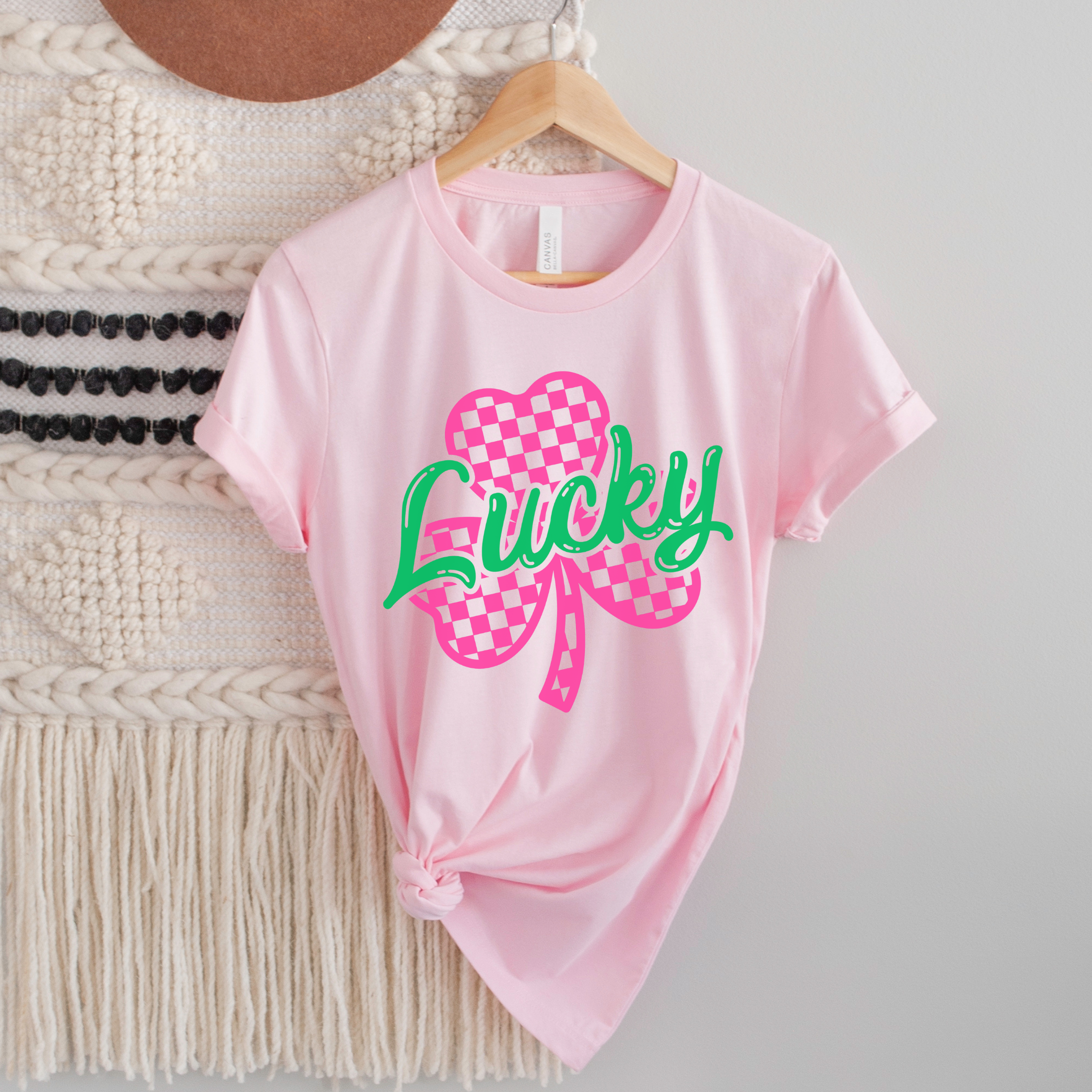Shop Lucky Checkered Shamrock | St. Patrick's Day Graphic Top-Tee at Ruby Joy Boutique, a Women's Clothing Store in Pickerington, Ohio