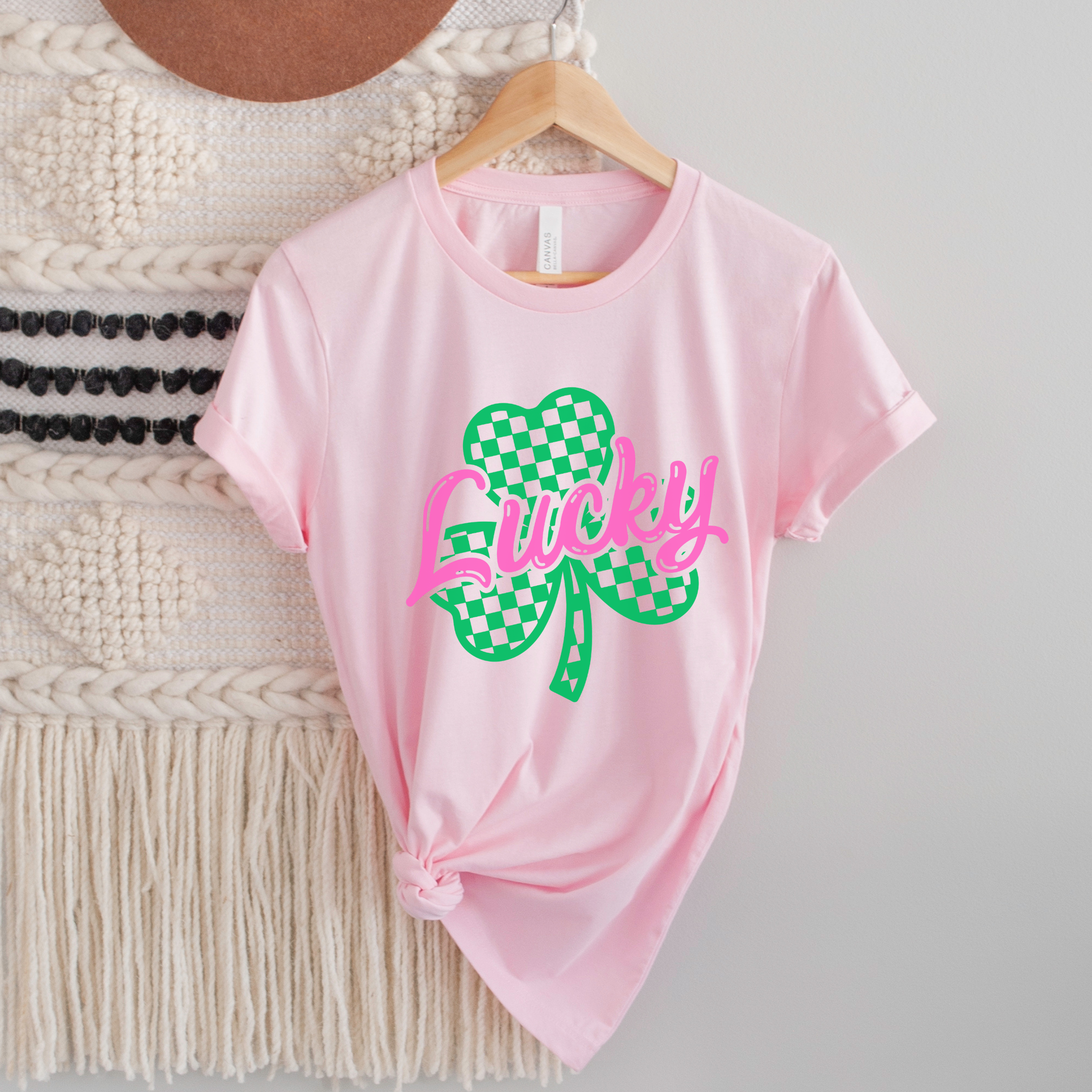 Shop Lucky Checkered Shamrock | St. Patrick's Day Graphic Top- at Ruby Joy Boutique, a Women's Clothing Store in Pickerington, Ohio