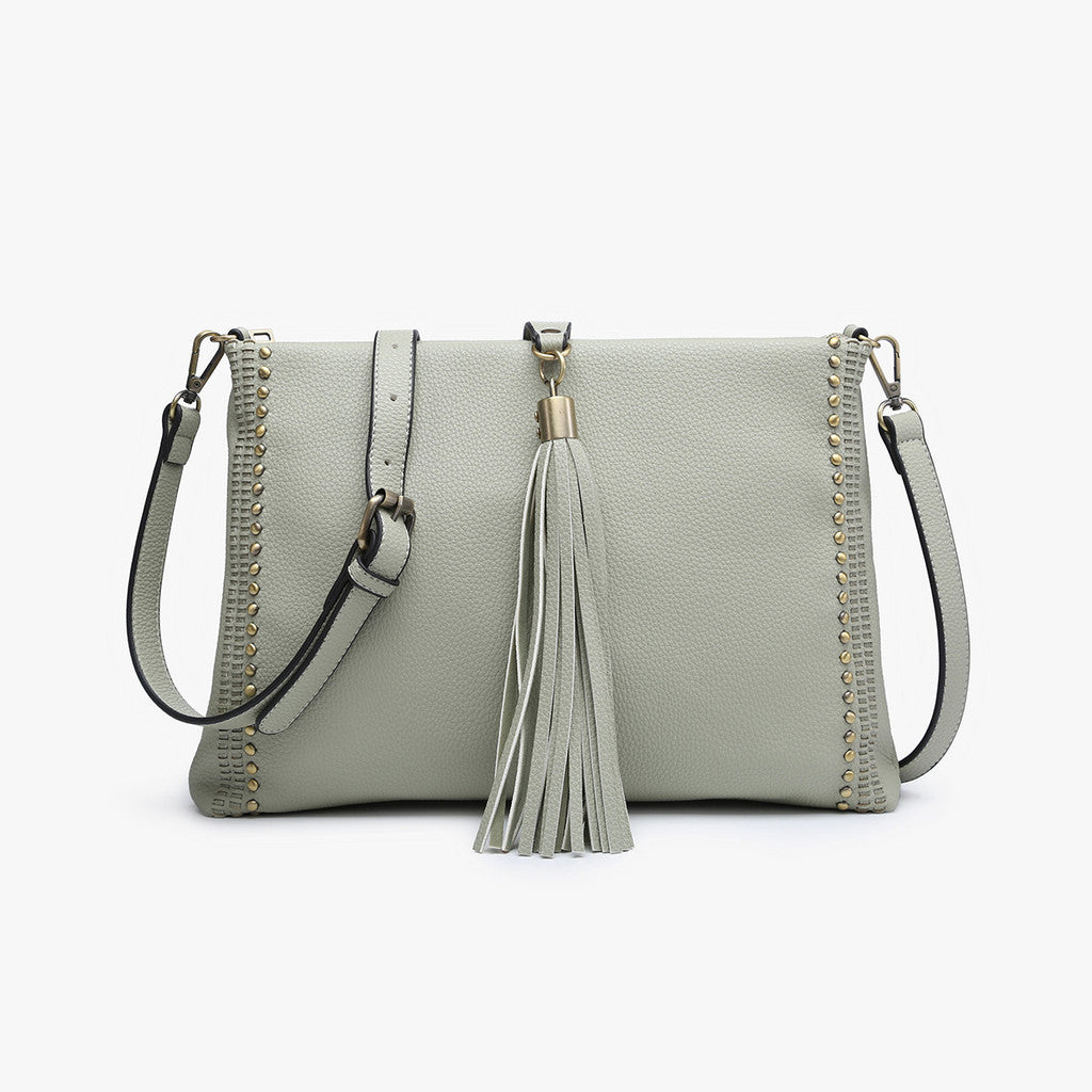 Shop Marie Crossbody with Grommet Details and Tassel-Purse at Ruby Joy Boutique, a Women's Clothing Store in Pickerington, Ohio