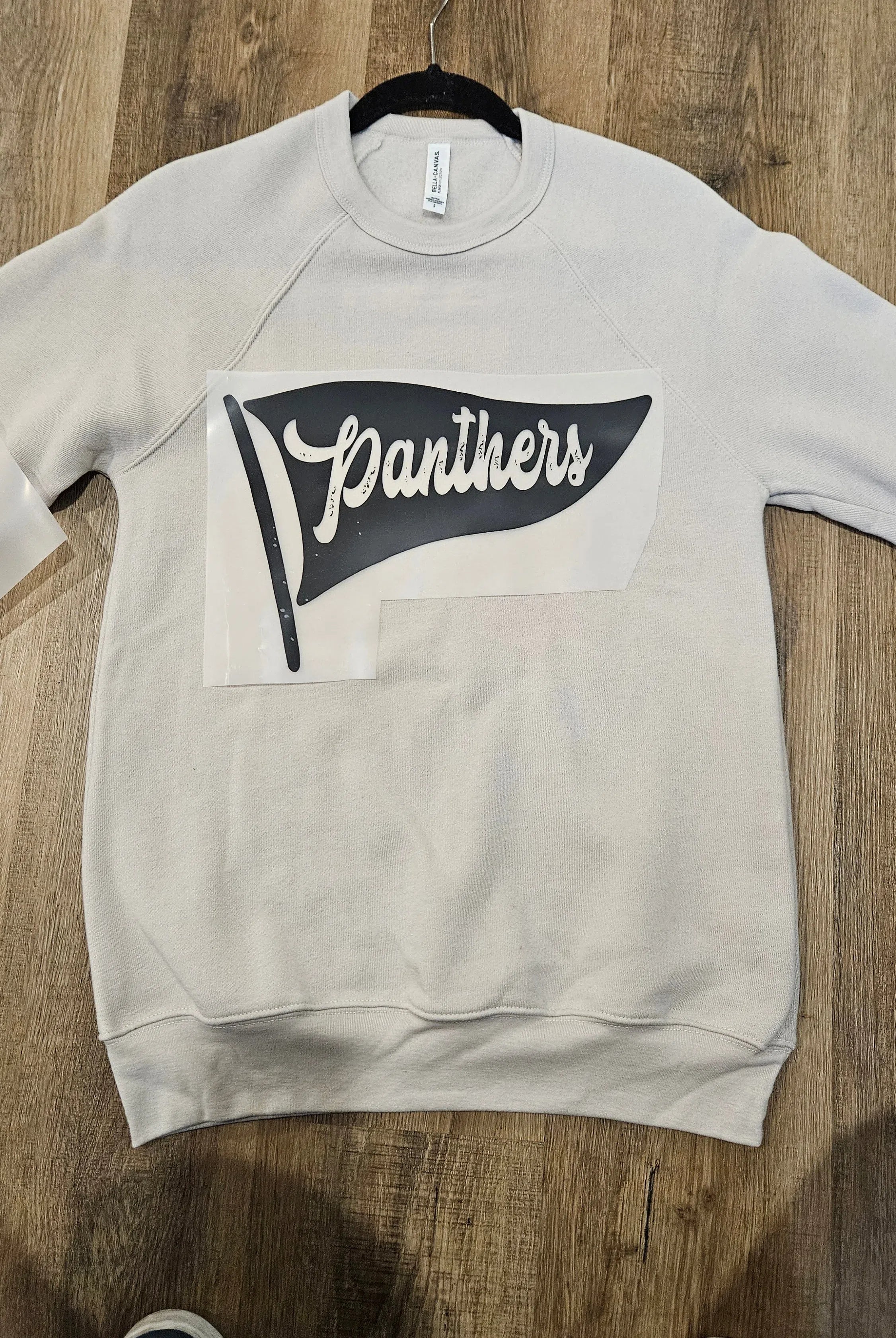 Shop Mascot Pennant Graphic - Panthers- at Ruby Joy Boutique, a Women's Clothing Store in Pickerington, Ohio