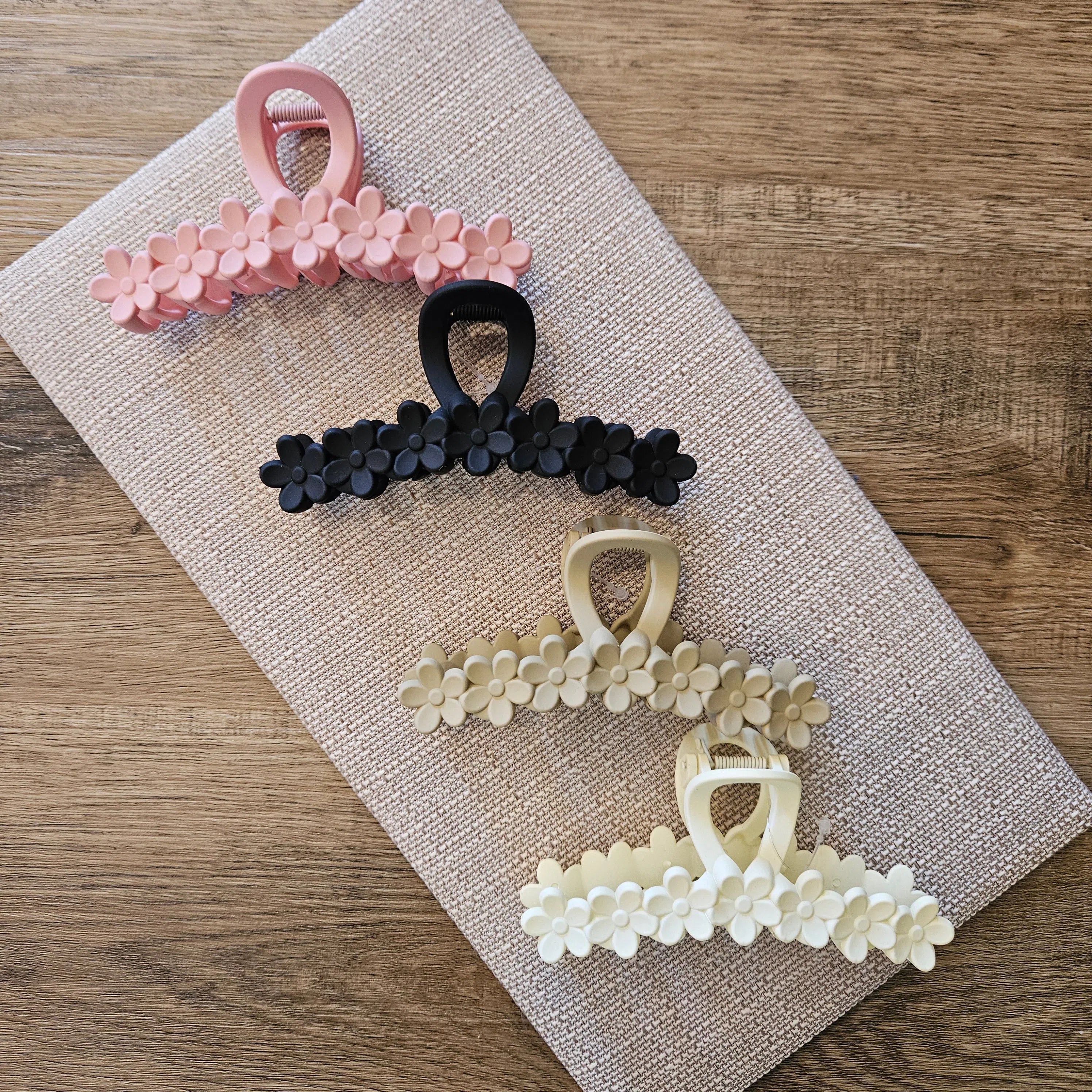 Shop Matte Flower Claw Clip-Hair Claws & Clips at Ruby Joy Boutique, a Women's Clothing Store in Pickerington, Ohio