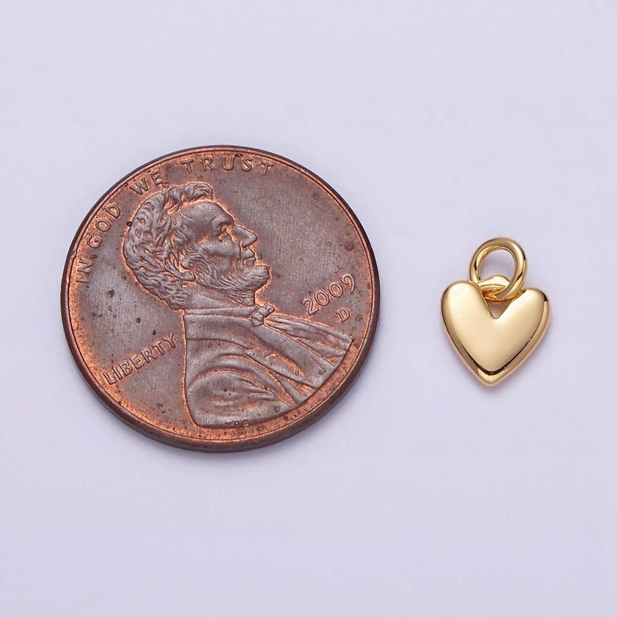 Shop Mini Heart Charm | Gold-Filled- at Ruby Joy Boutique, a Women's Clothing Store in Pickerington, Ohio