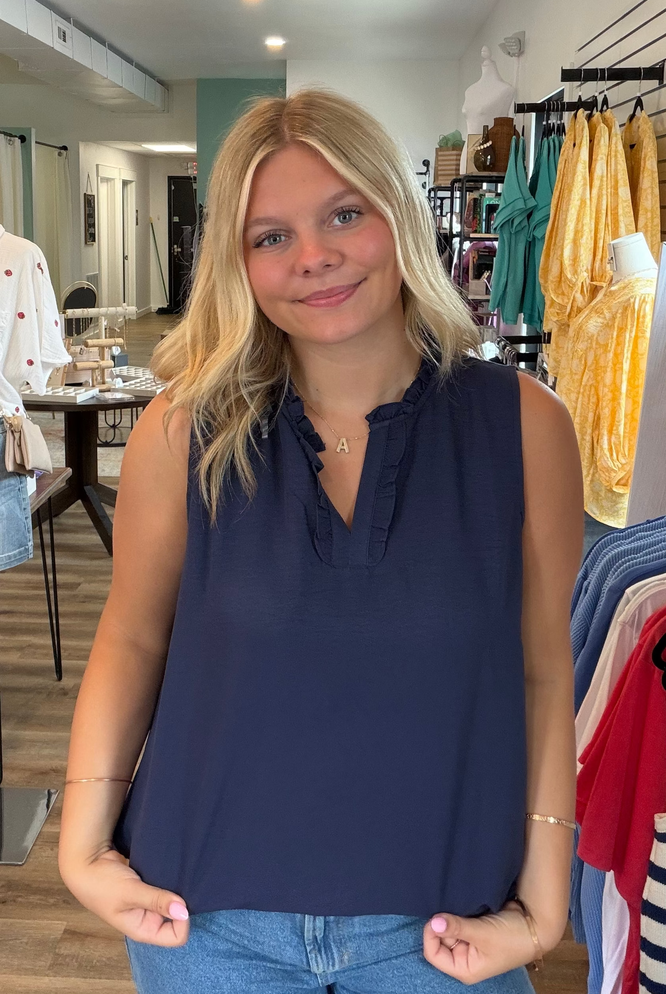 Shop Navy Ruffle Neck Sleeveless Blouse- at Ruby Joy Boutique, a Women's Clothing Store in Pickerington, Ohio