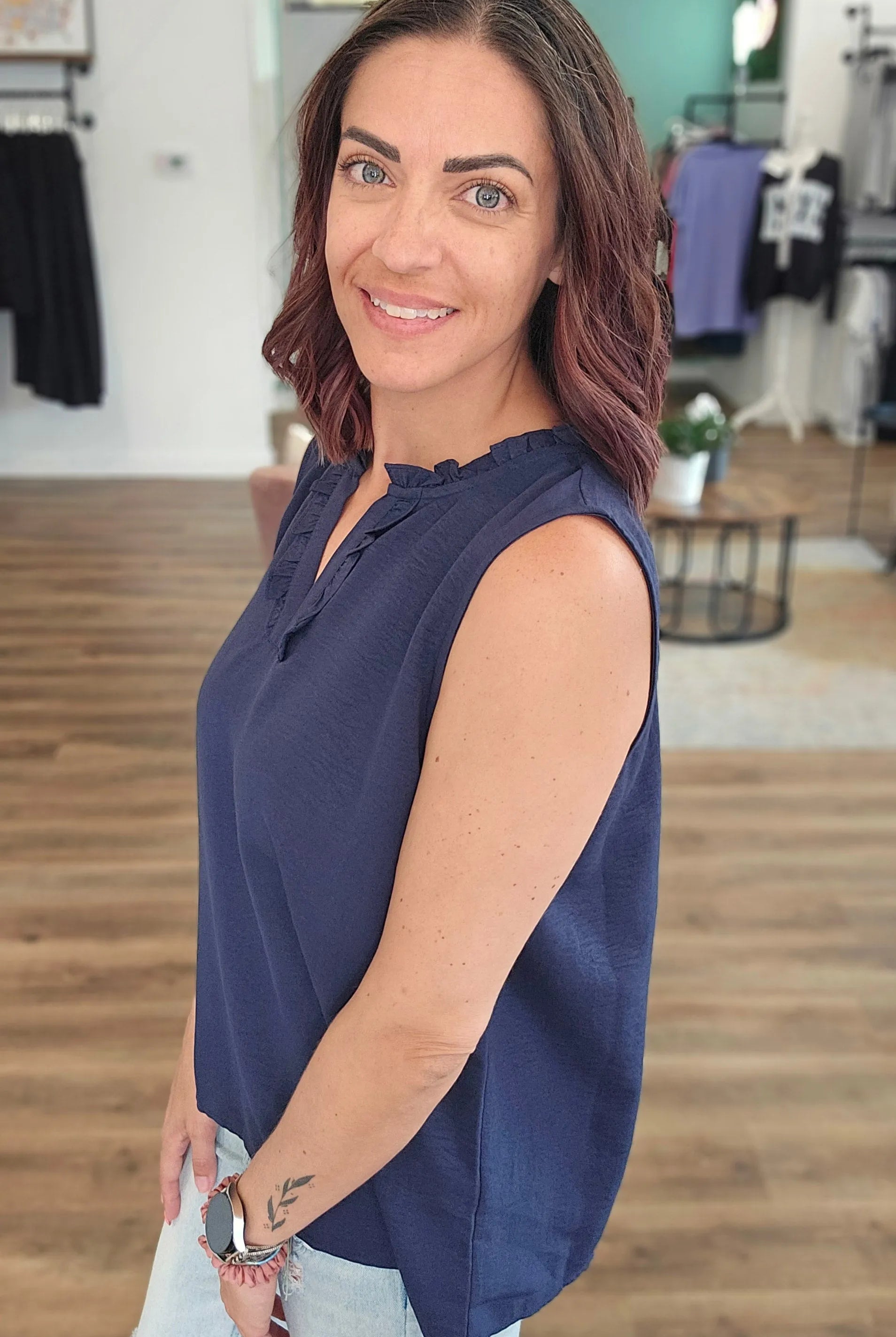Shop Navy Ruffle Neck Sleeveless Blouse- at Ruby Joy Boutique, a Women's Clothing Store in Pickerington, Ohio