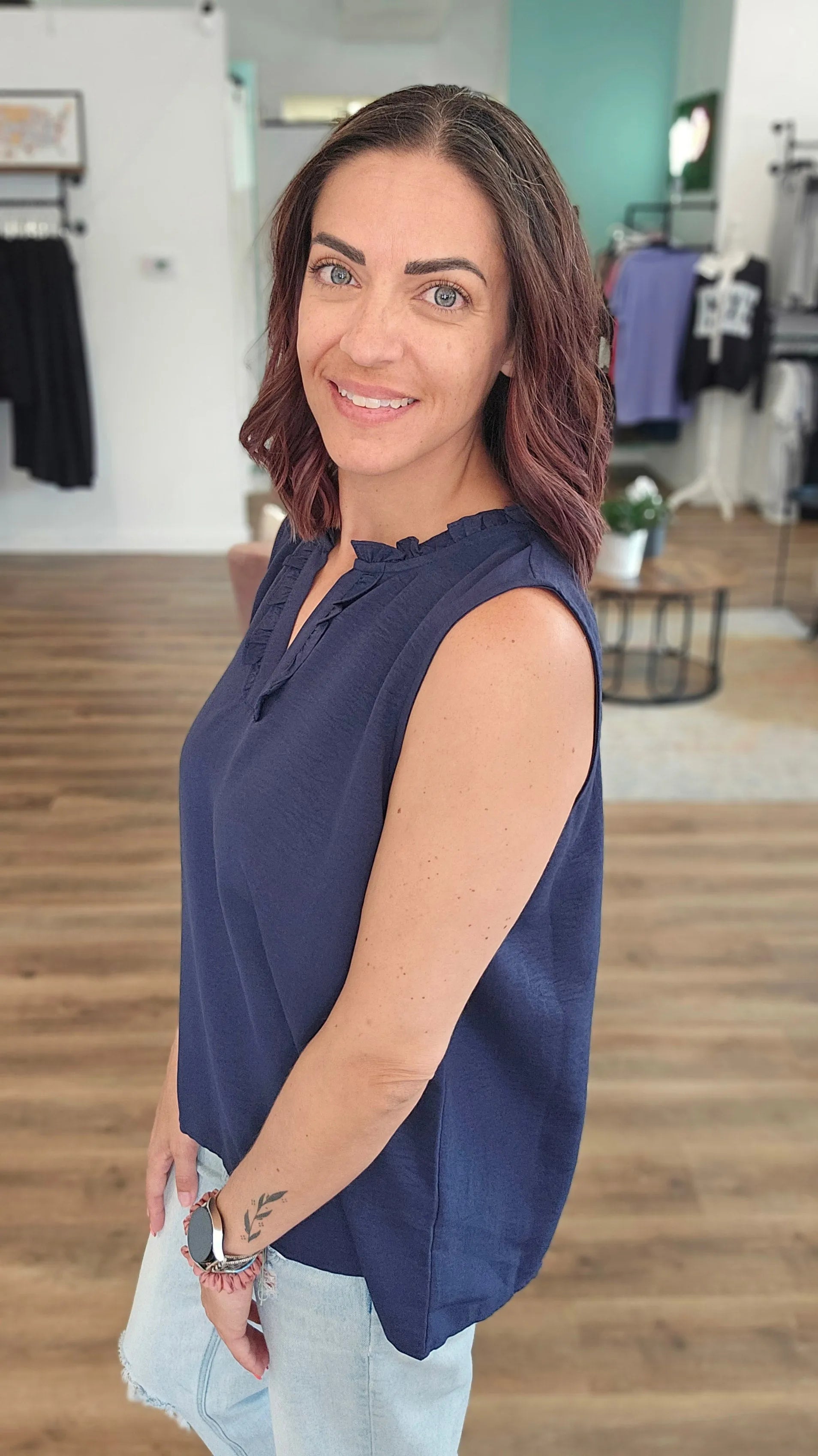 Shop Navy Ruffle Neck Sleeveless Blouse- at Ruby Joy Boutique, a Women's Clothing Store in Pickerington, Ohio