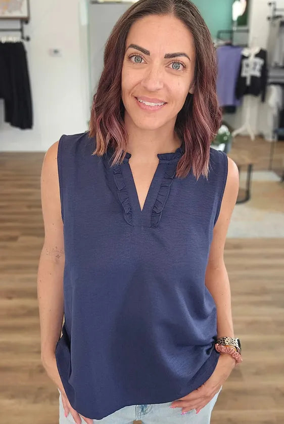 Shop Navy Ruffle Neck Sleeveless Blouse- at Ruby Joy Boutique, a Women's Clothing Store in Pickerington, Ohio