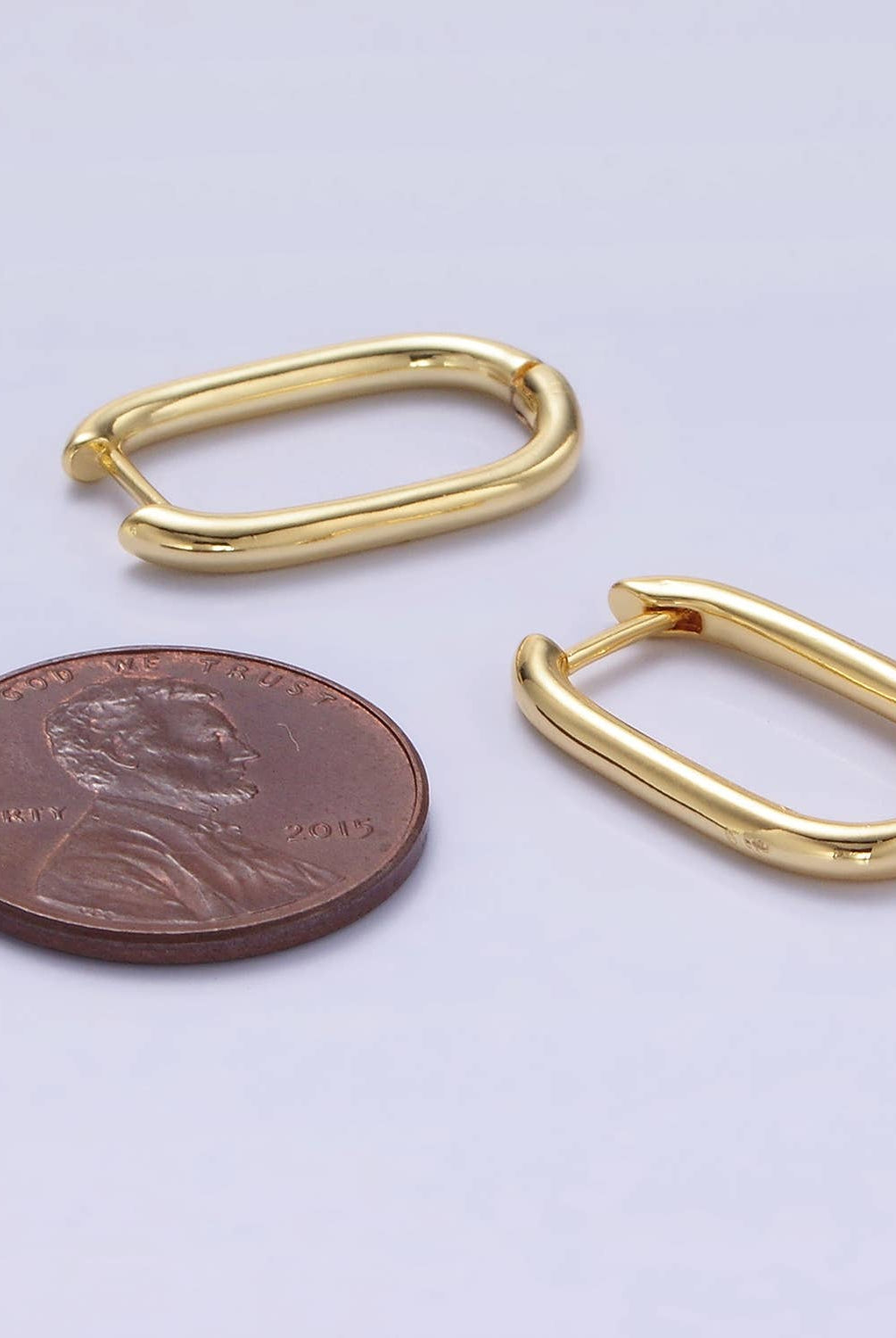 Shop Oblong Huggie Earrings- at Ruby Joy Boutique, a Women's Clothing Store in Pickerington, Ohio