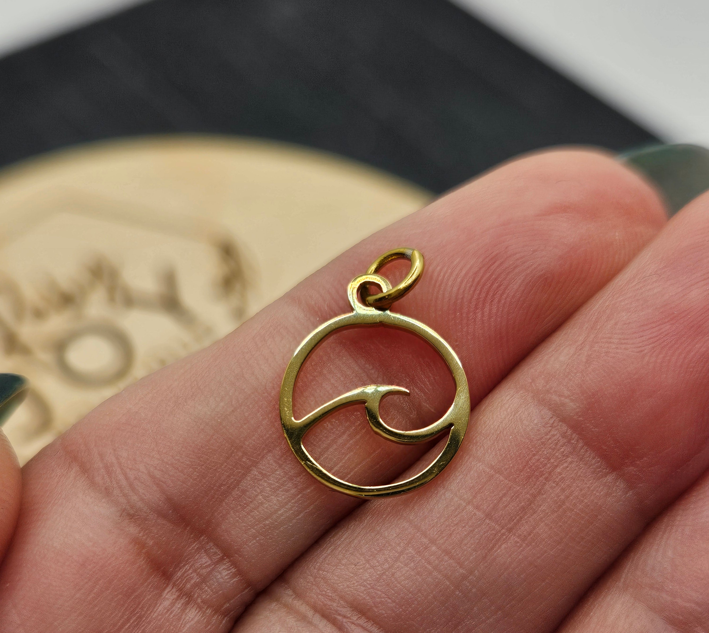 Shop Ocean Wave Charm- at Ruby Joy Boutique, a Women's Clothing Store in Pickerington, Ohio