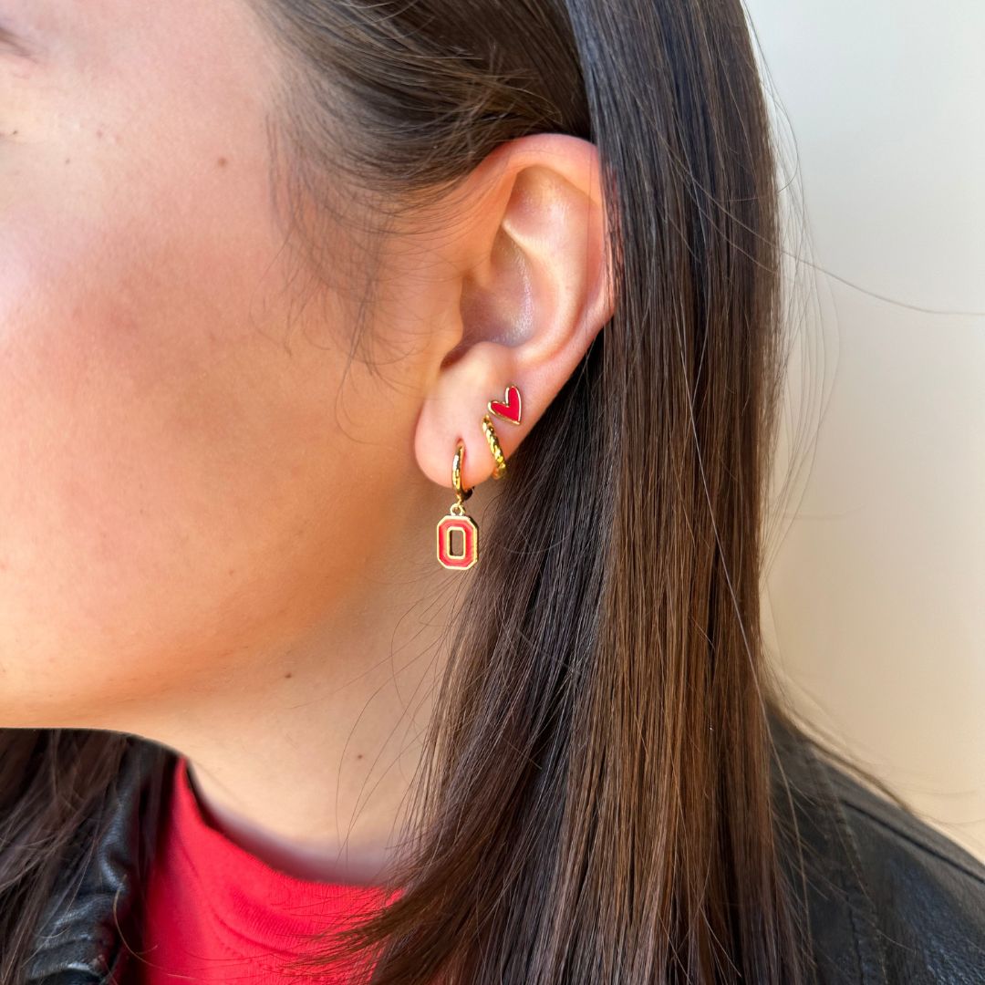 Shop Ohio State University Logo Charm Huggie Earrings- at Ruby Joy Boutique, a Women's Clothing Store in Pickerington, Ohio