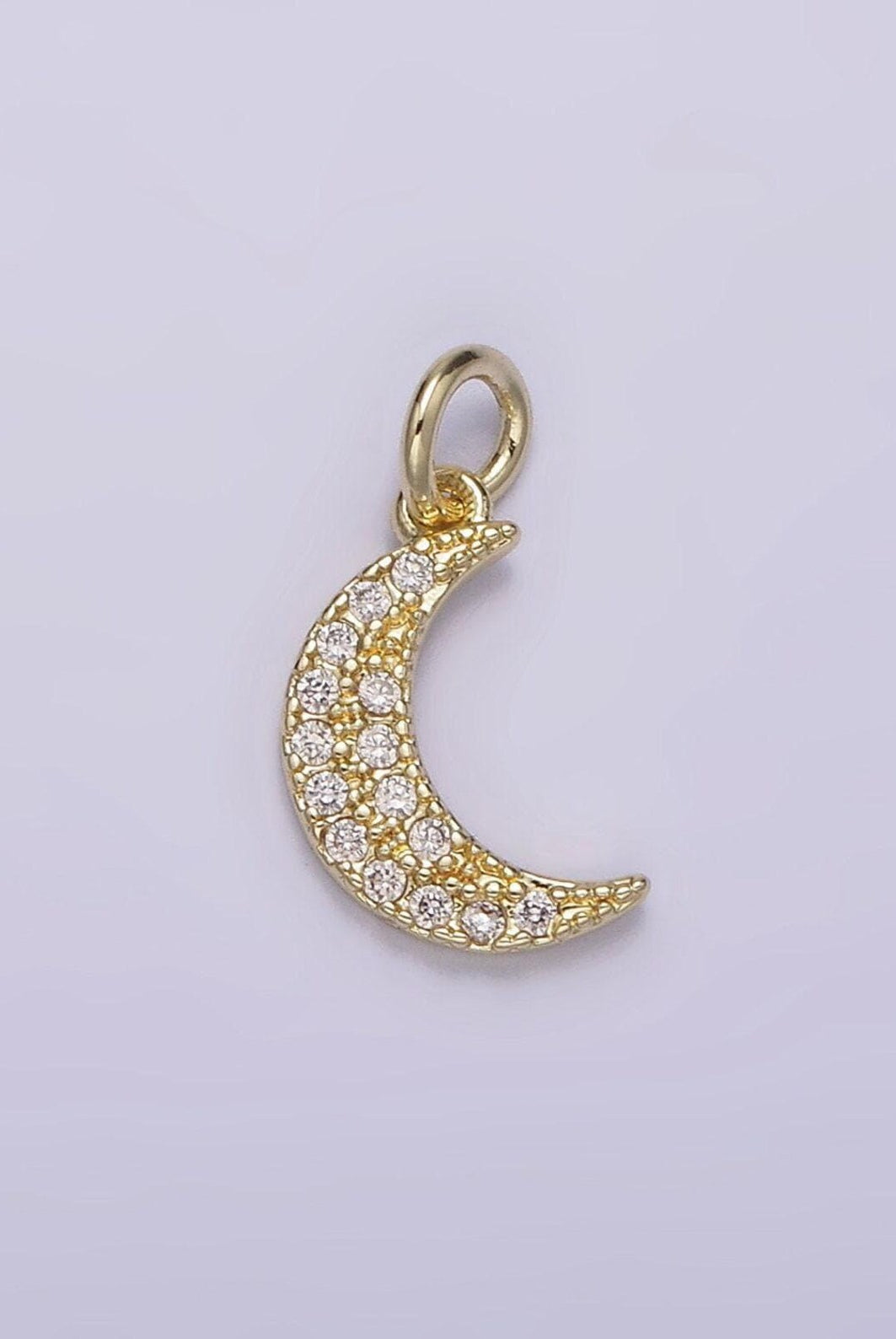 Shop Pave Crescent Moon Charm- at Ruby Joy Boutique, a Women's Clothing Store in Pickerington, Ohio