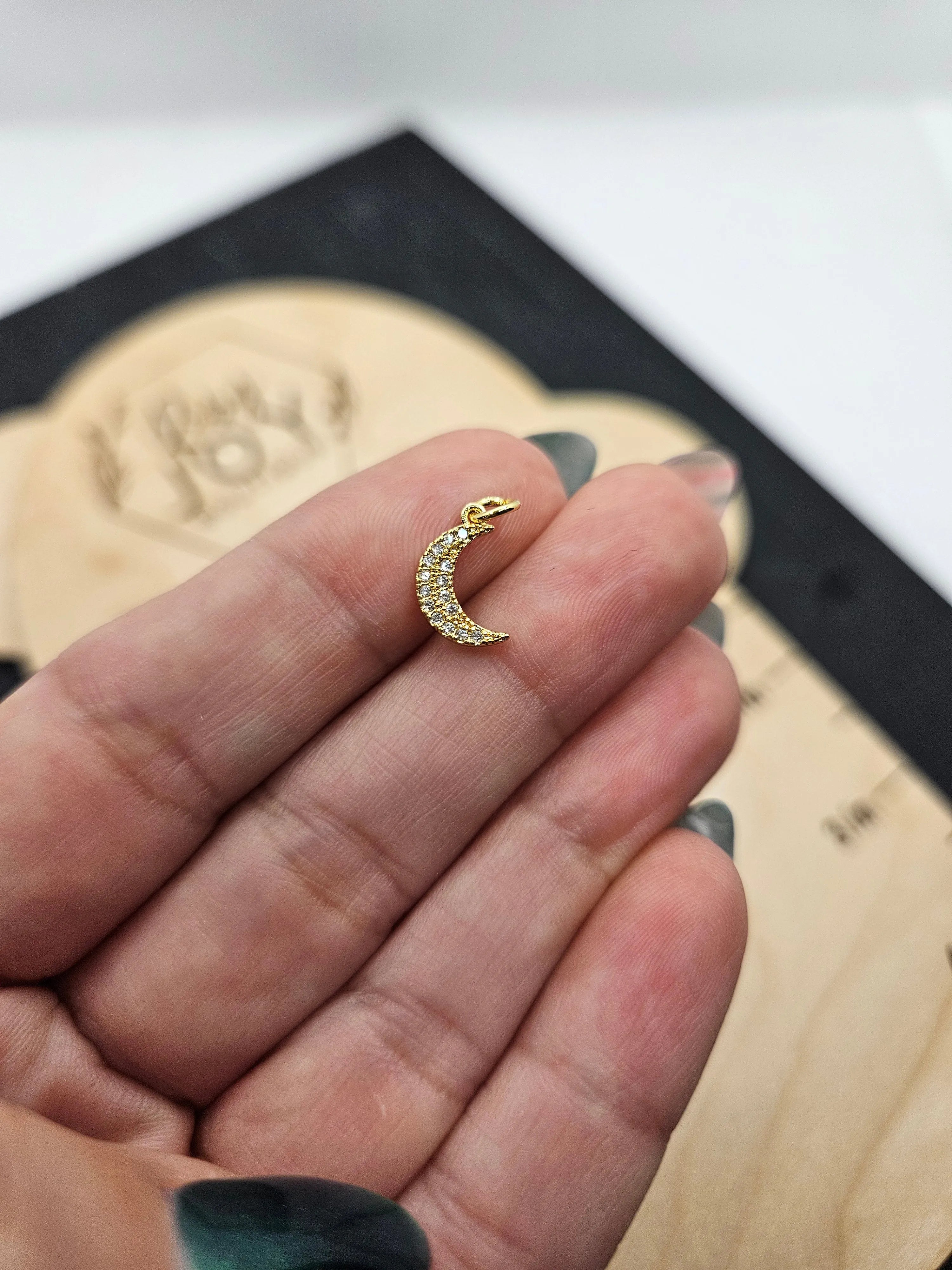 Shop Pave Crescent Moon Charm- at Ruby Joy Boutique, a Women's Clothing Store in Pickerington, Ohio