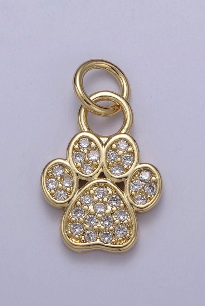 Shop Paw Print Charm-Gold at Ruby Joy Boutique, a Women's Clothing Store in Pickerington, Ohio